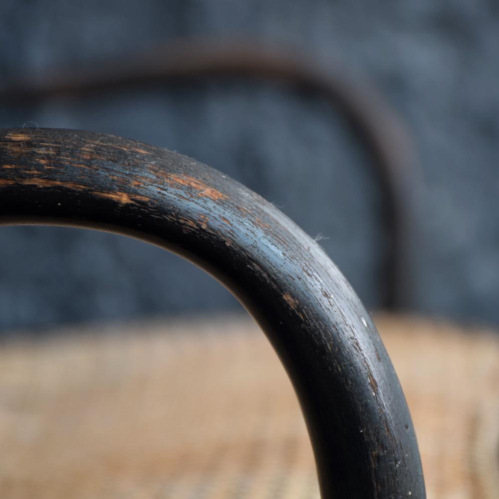Thonet ebonised Bentwood and cane Child's settee, circa 1900.
We are proud to offer a charming antique child’s wicker settee made by the well renowned designer Thonet. Ebonised wood finish, original wicker seat and stamped with the makers mark is