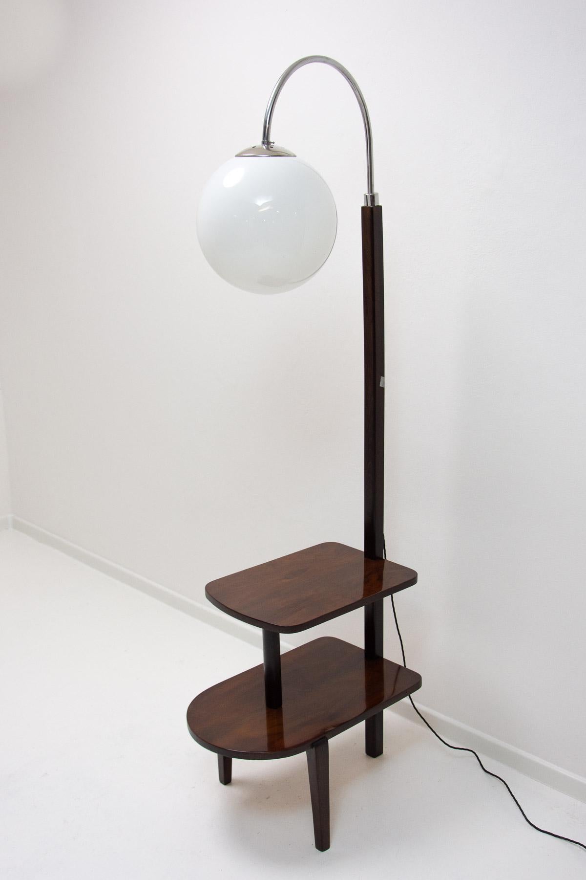Thonet floor lamp, cataloque No. D-623, ART DECO furniture, made in Bohemia in 1920/1930´s.  Chrome-plated rod with a wooden part – walnut wood.  Can be used also as a side table or nightstand. Fully restored, new wiring, in high gloss finish. 