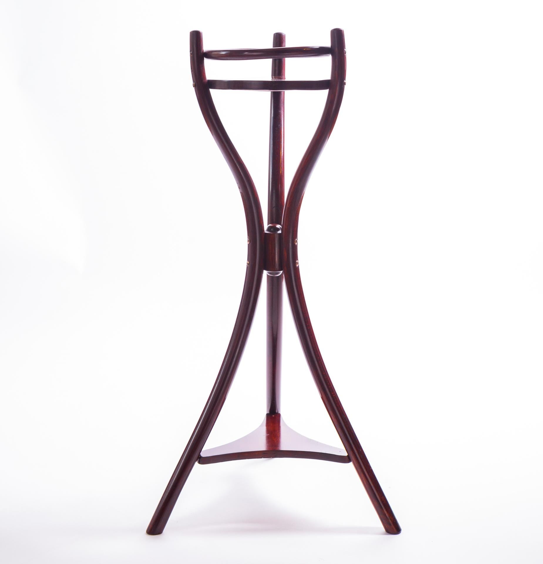Thonet Gueridon, which is an icon of applied art of the first half of the 20th century. Object is original and signed on the bottom of the upper base. 

Stand was made in the technique patented by the outstanding designer and furniture pioneer -