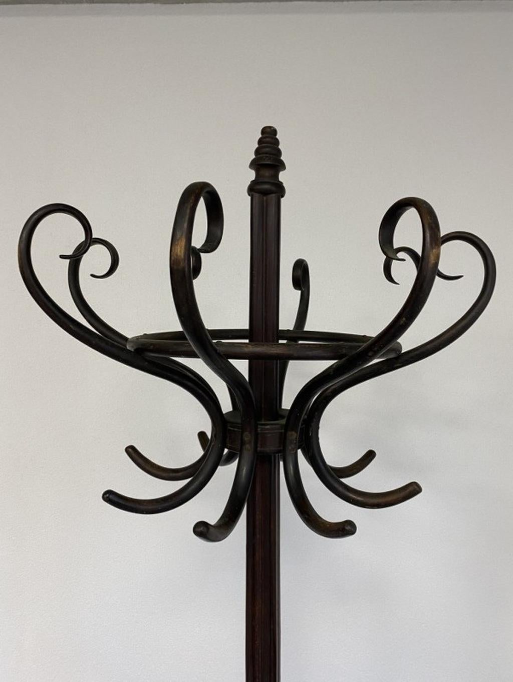 Large Thonet hall coat stand with umbrella holder. Very good original condition.
