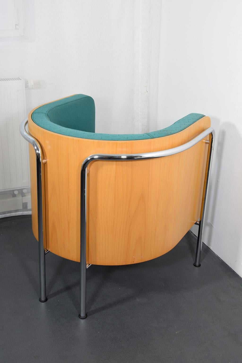 Thonet lounge chair modell S 3001 from Christoph Zschocke for Thonet, 1990.
Chromed steel tube. Bent plywood. Original turquoise upholstery fabric.
Minor stain on the upholstered seat.
  