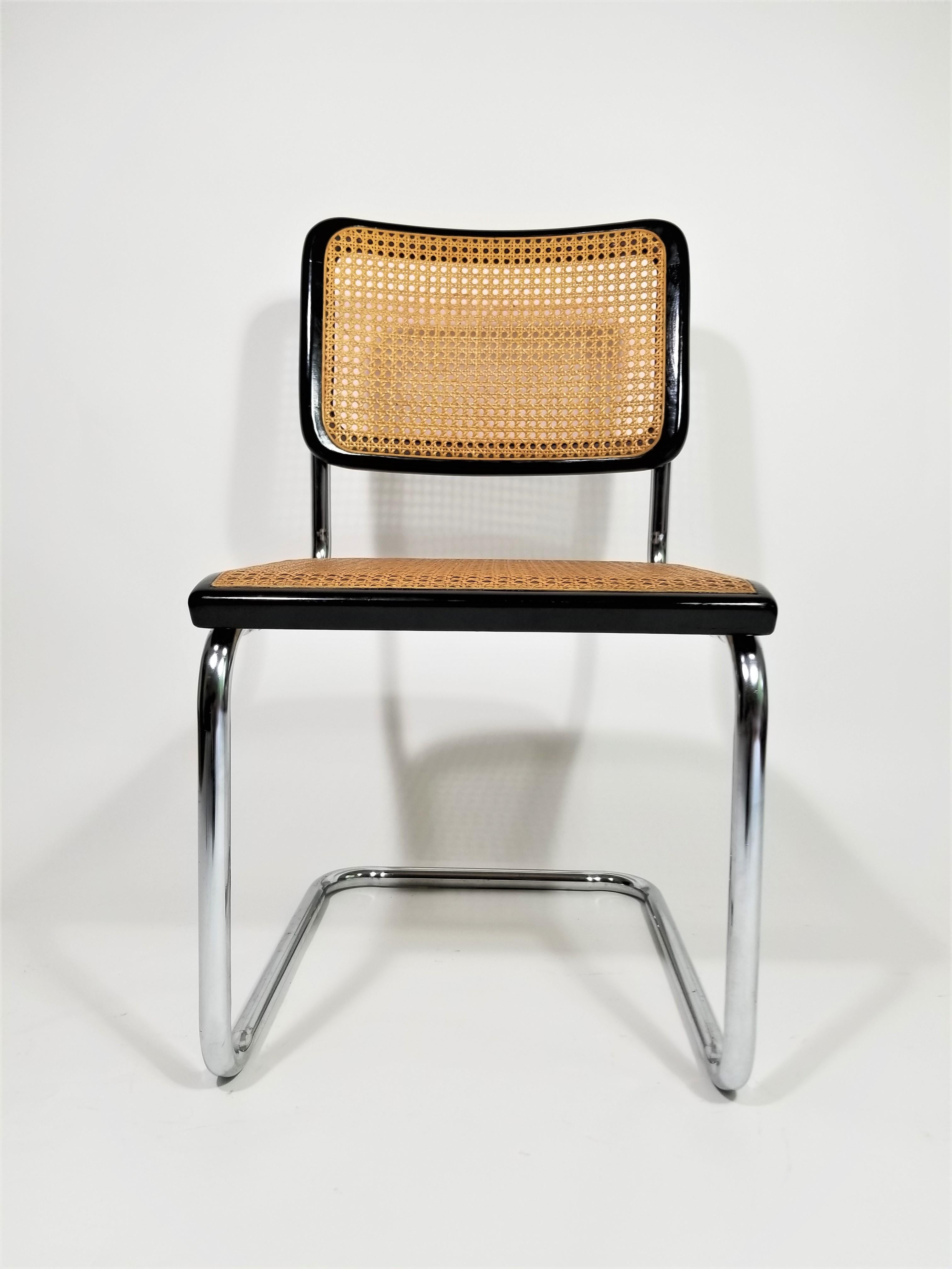 Authentic 1960s Mid Century Thonet Marcel Breuer Cesca Side Chair with Black Finish. Cane Seats and Backs. Classic Chrome Cantilever Frames. 
Made by Thonet New York, NY. Still retains Original Marking Tag.
Complimentary local NYC delivery can be