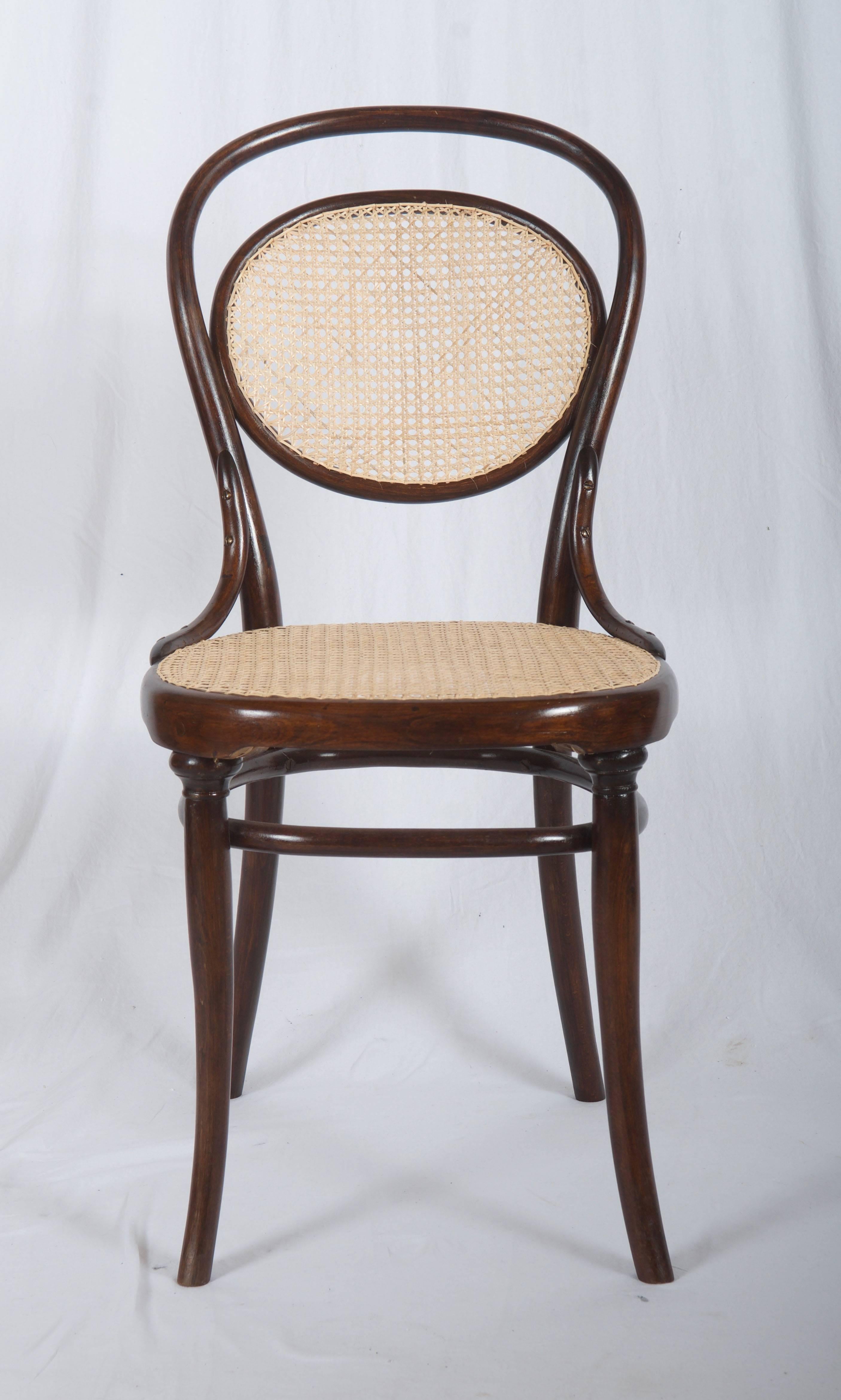 Beech bentwood with caned seat and backrest. Made in Austria by Gebrüder Thonet, circa 1890.
Fully restored.