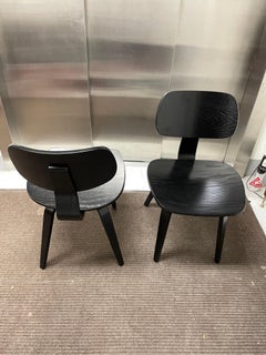 Thonet Pair of black stained wood chairs