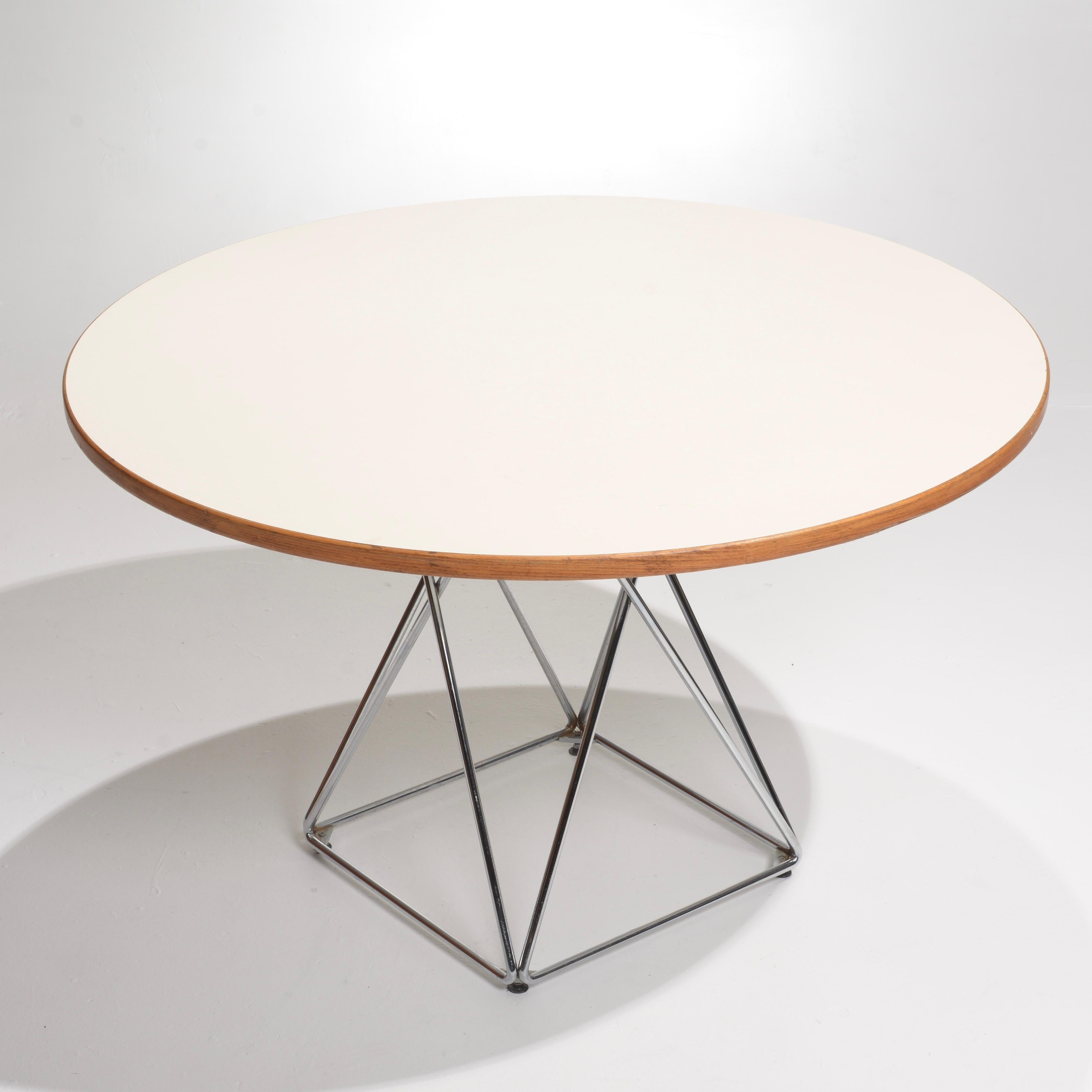 Round dining table designed in the 1970s by Thonet.