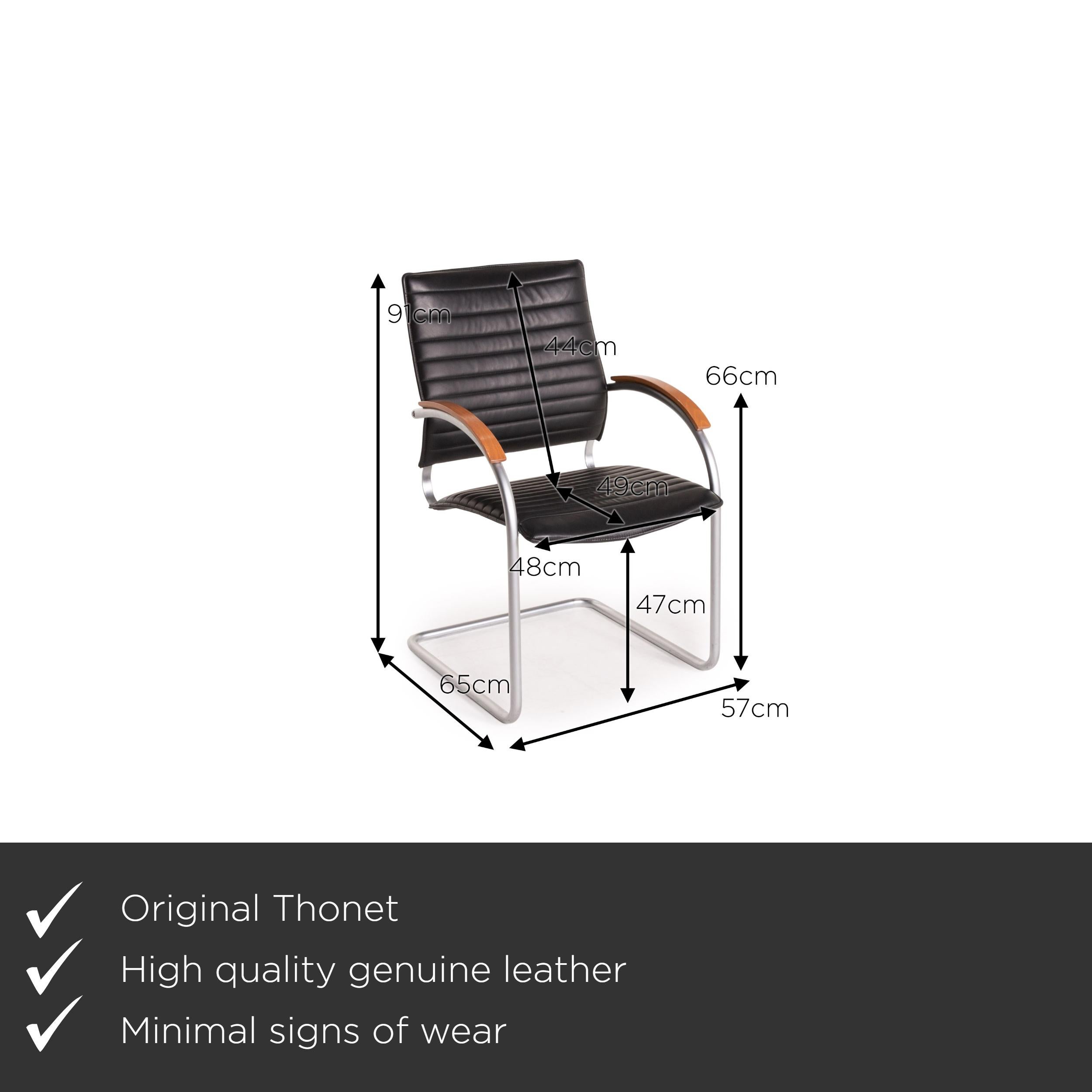 We present to you a Thonet S 74 leather chair black 2x cantilever chairs.
 SKU: #16063
 

 Product measurements in centimeters:
 

 depth: 65
 width: 57
 height: 91
 seat height: 47
 rest height: 66
 seat depth: 49
 seat width: 48
