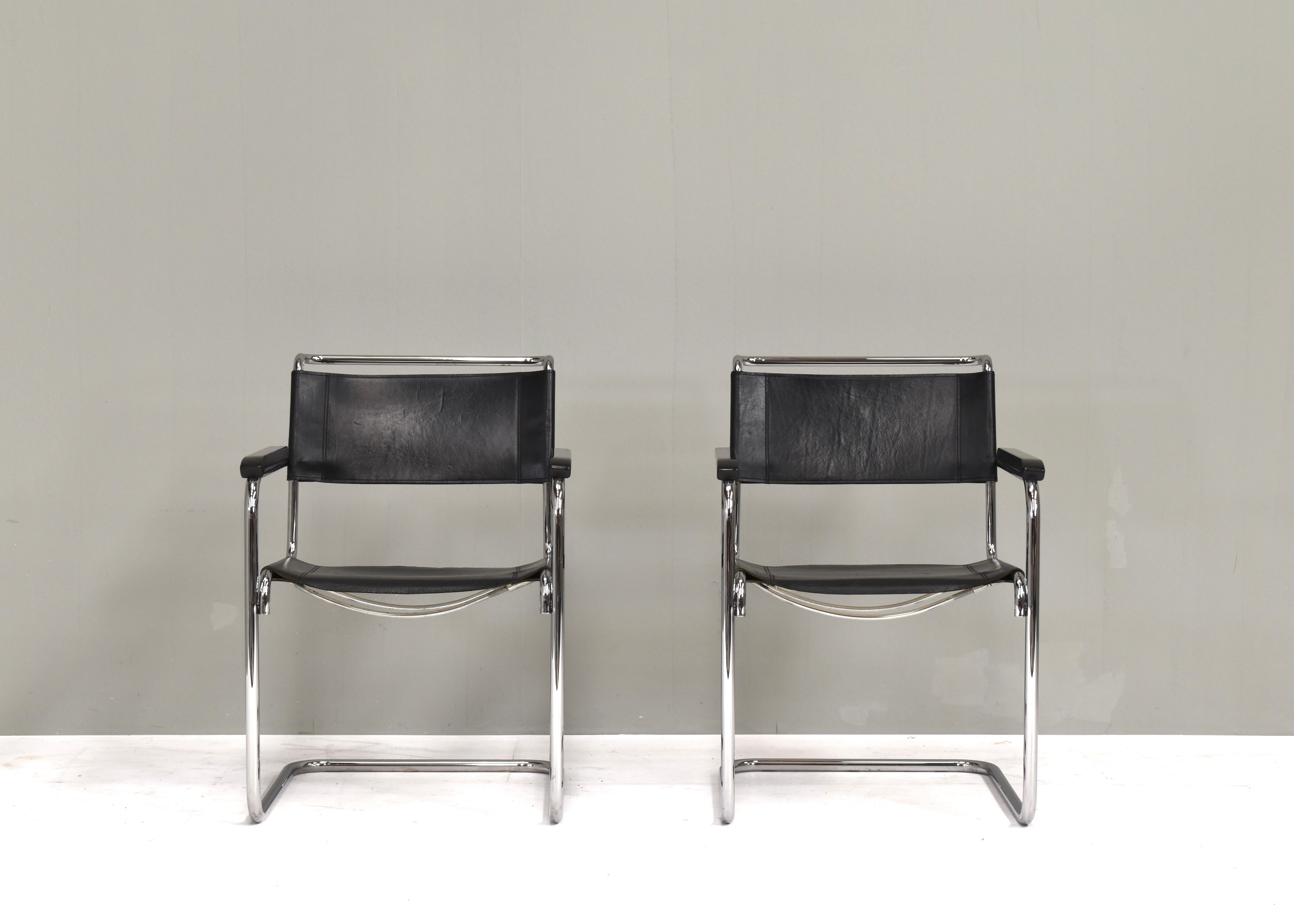 Designer: Mart Stam
Manufacturer: Thonet (stamped in leather underneath seat)
Country: Germany
Model: Thonet S34 Cantilever (Freischwinger) armchair
Color: Black / Silver
Material: Black leather / Wood / Chrome
Size in cm. WxDxH: 57x64x84 Seat