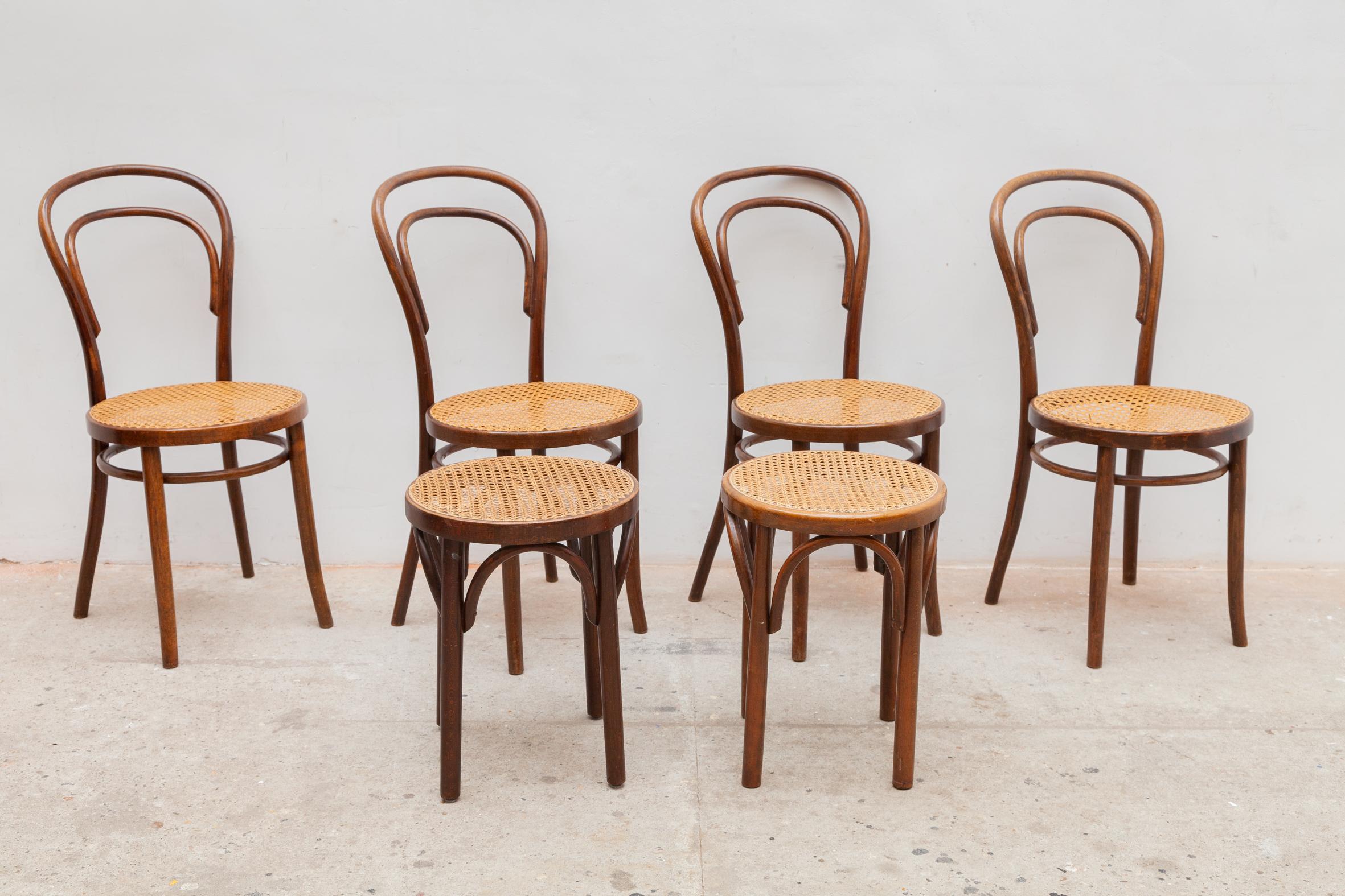 Set of six bentwood Thonet no.14 chairs and stools with the original handwoven cane seat. 
In original good condition with some wear of use. No.14 was the most simple chair out of the initial 14 launched in Thonet’s first catalogue of 1859.