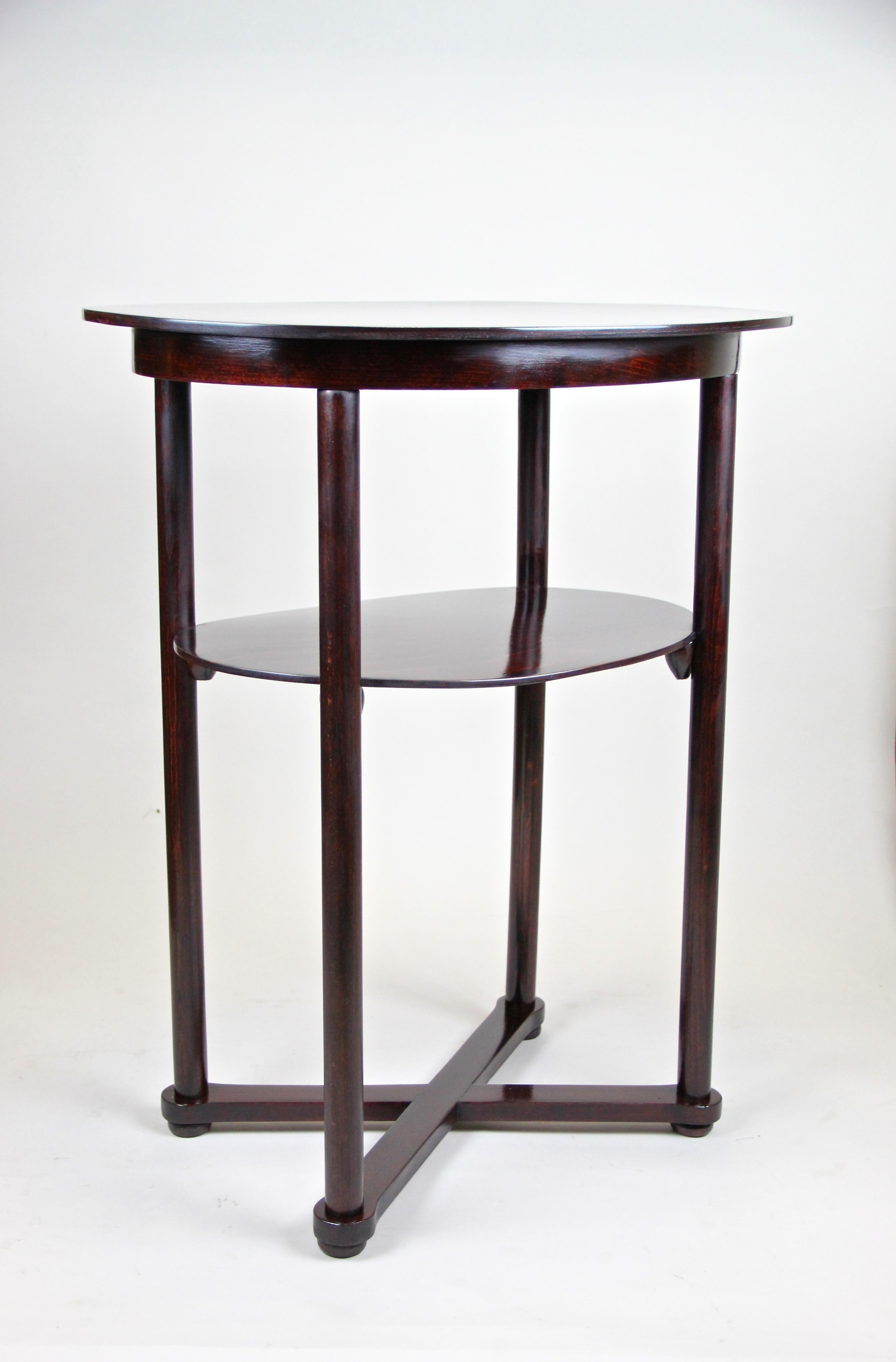 Gorgeous Art Nouveau Thonet side table from the renowned company of Thonet, circa 1910. Designed by the world famous Austrian designer Josef Hoffmann, this oval beechwood side table comes with an impressing timeless shape and fits perfect to modern