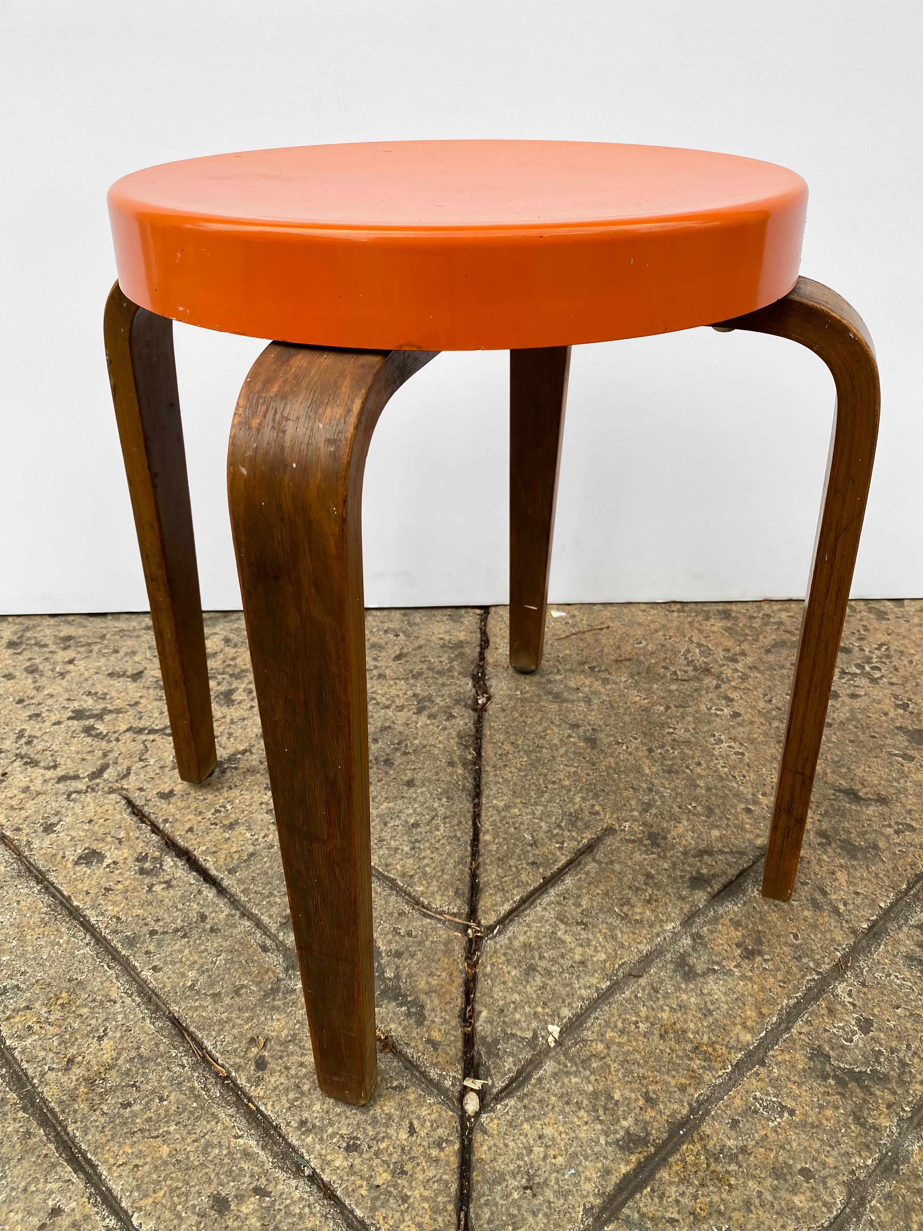 Functional and very useful Thonet stool! Plastic Cast top with molded curved legs. Perfect to sit on or use as a small side table. Legs show wear, but top polished up very nice!