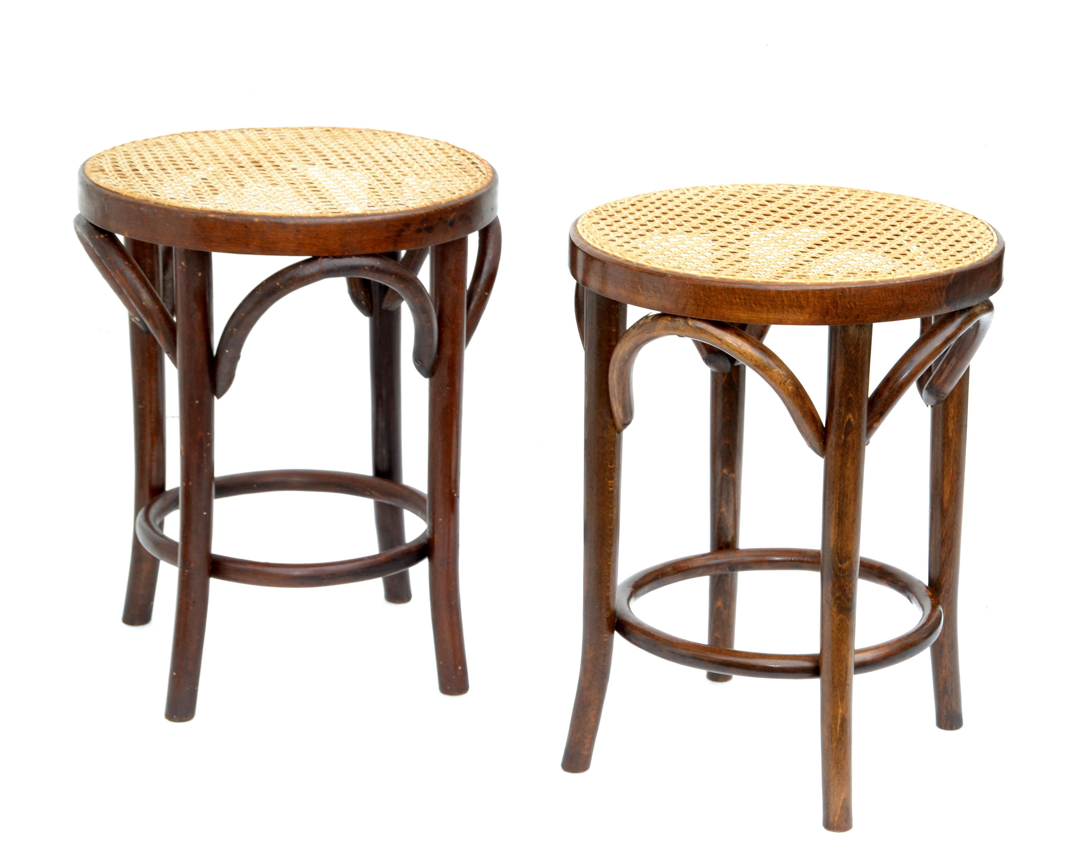 Set of two bentwood beech Michael Thonet style stools with the original handwoven cane seat.
In all original condition with some wear to the wood.
Caning of seats are perfect, no breaks.