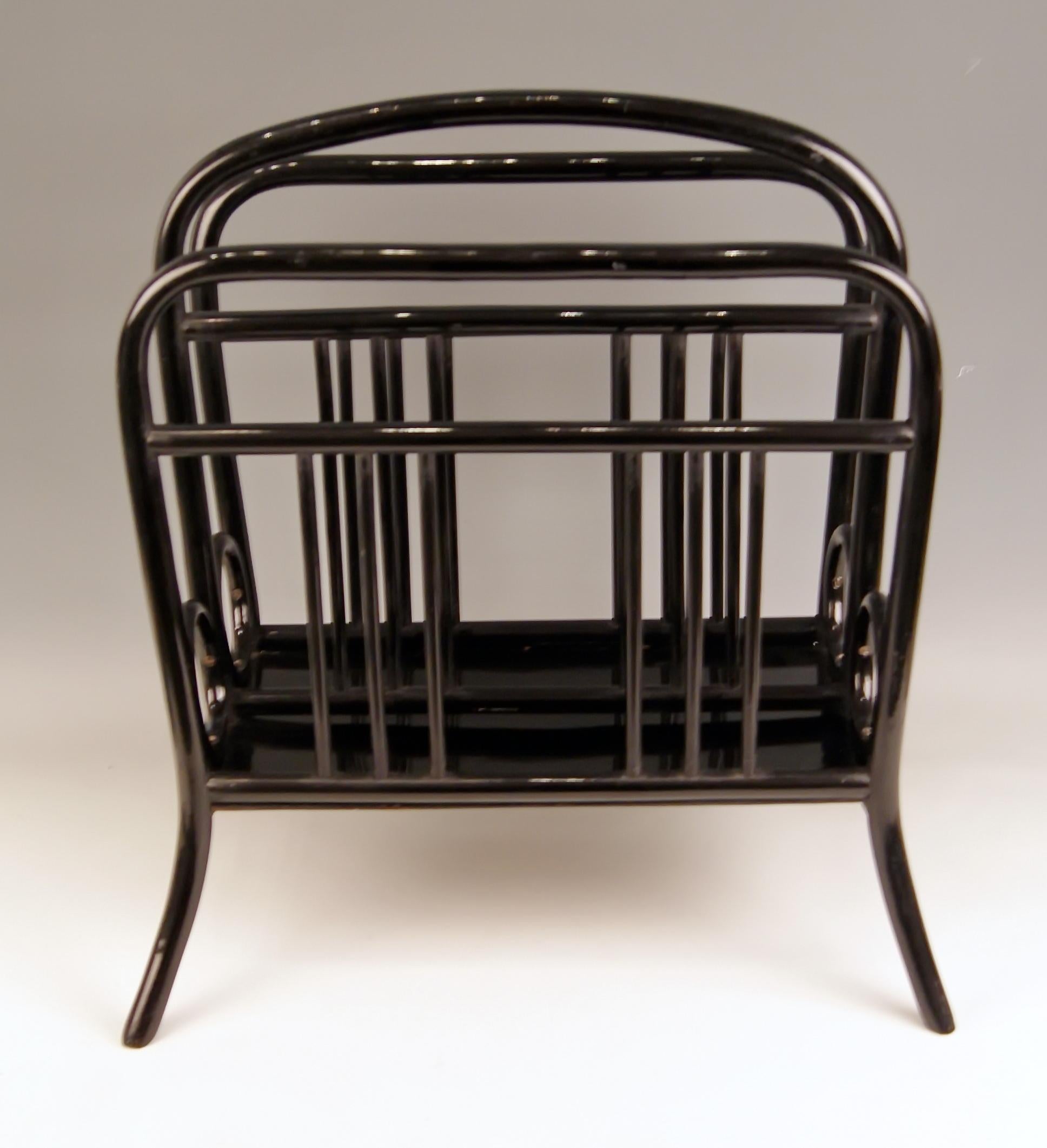 Thonet Vienna most elegant music or newspaper or magazine rack (=for holding newspapers or music sheets)

Model number 33
This model was created before the year 1904 by Austrian Manufactory Thonet Brothers. 

High quality handwork or stunningly