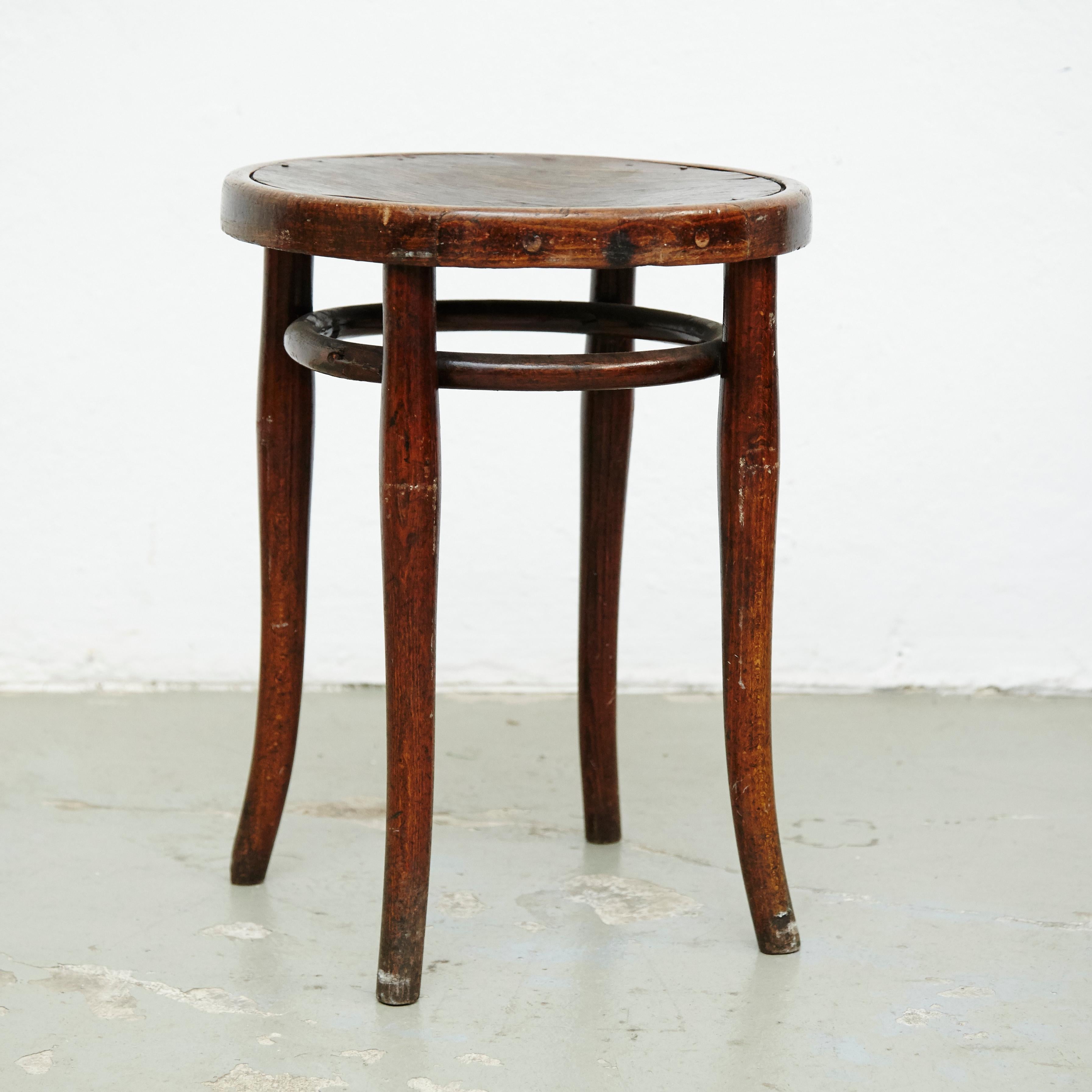 Thonet stool, manufactured by Thonet, circa 1920.

It preserves the original label to the underside.

In good original condition, with minor wear consistent with age and use, preserving a beautiful patina.

Thonet was the son of master tanner