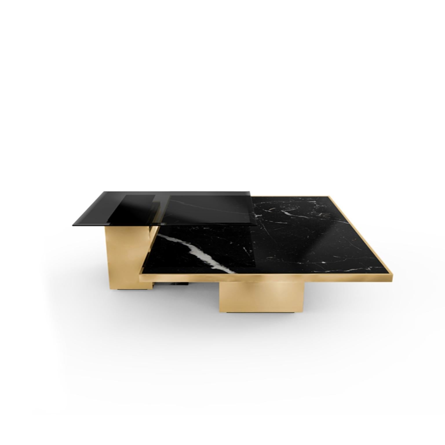 Expertly crafted with Nero Marquina marble, black lacquer, polished brass and with a smoked mirror top, the Thor center table is a stately design. This impactful piece was created to be the center of attention of any living room.
Materials
Body: