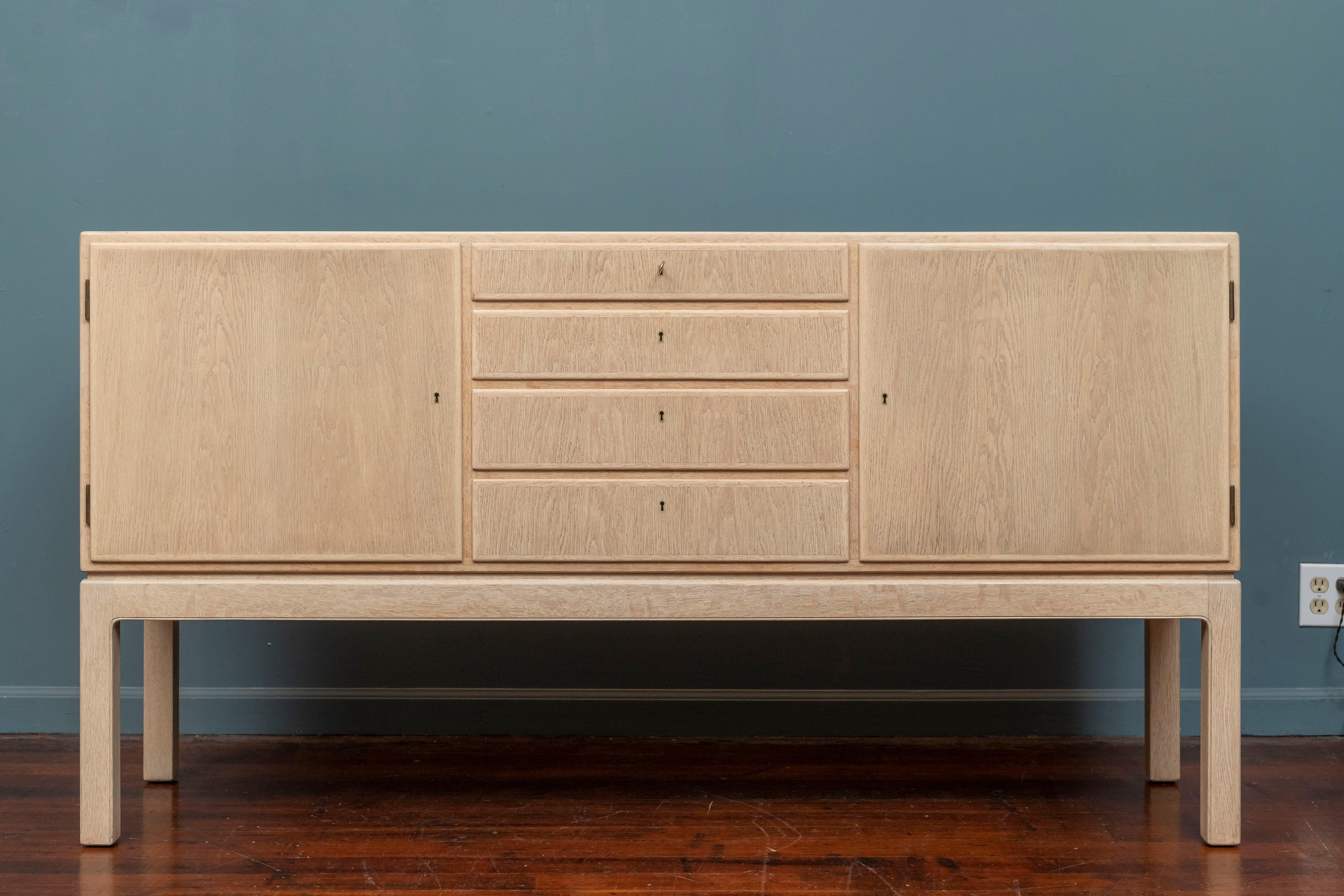 Scandinavian Modern credenza by Thorald Madsens for Snedkeri, Denmark. High quality construction and materials by a well regarded cabinetmaker from the 1930-40s. Made from teak and oak newly refinished in a white wash or pickled finish. Simple yet