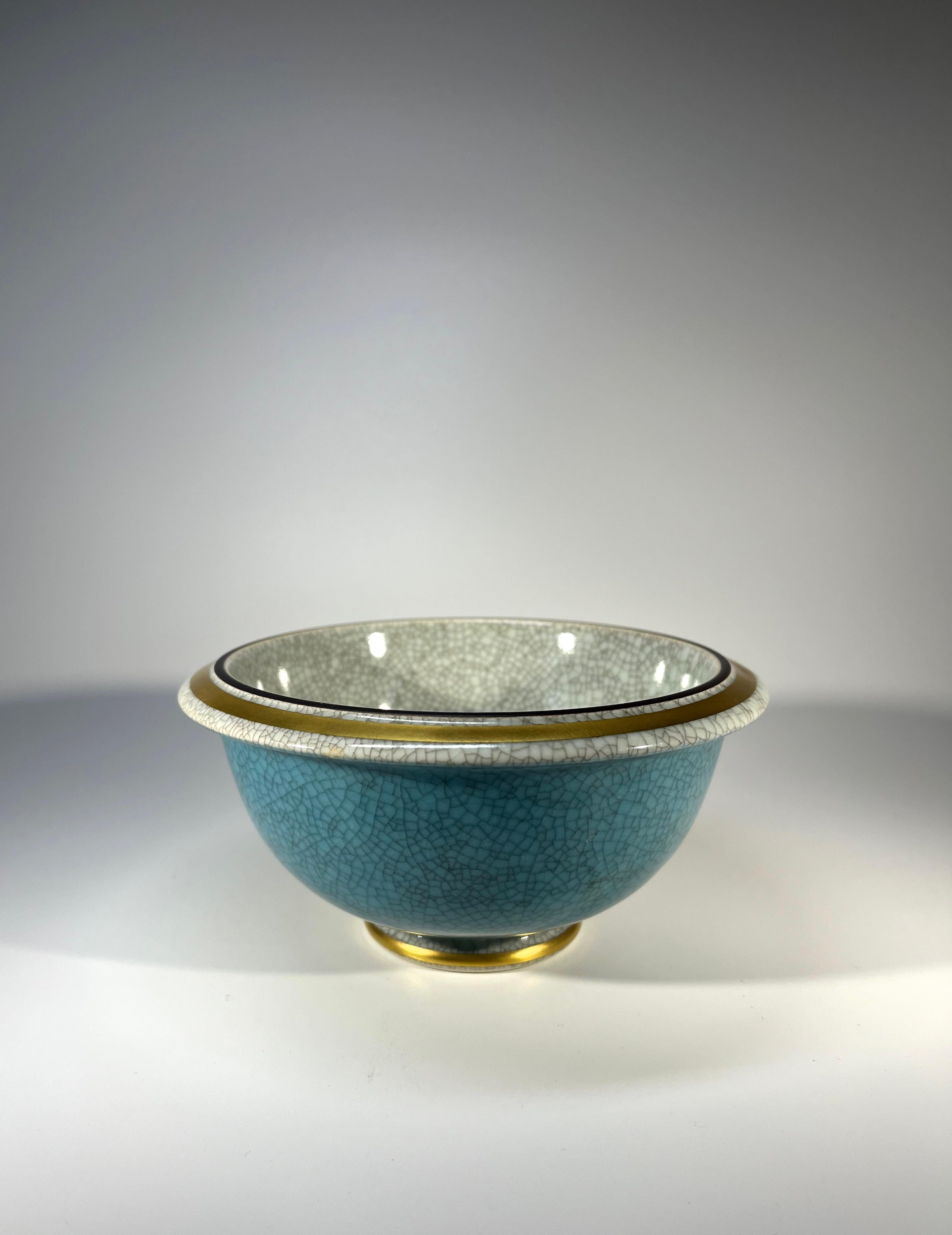 Pudding basin shaped Royal Copenhagen porcelain, turquoise and grey crackle glazed bowl
A weighty bowl decorated with broad gilded band to rim
A super piece from Thorkild Olsen
Circa 1960's
Stamped and numbered 2527
Height 2.5 inch, Diameter 5.5