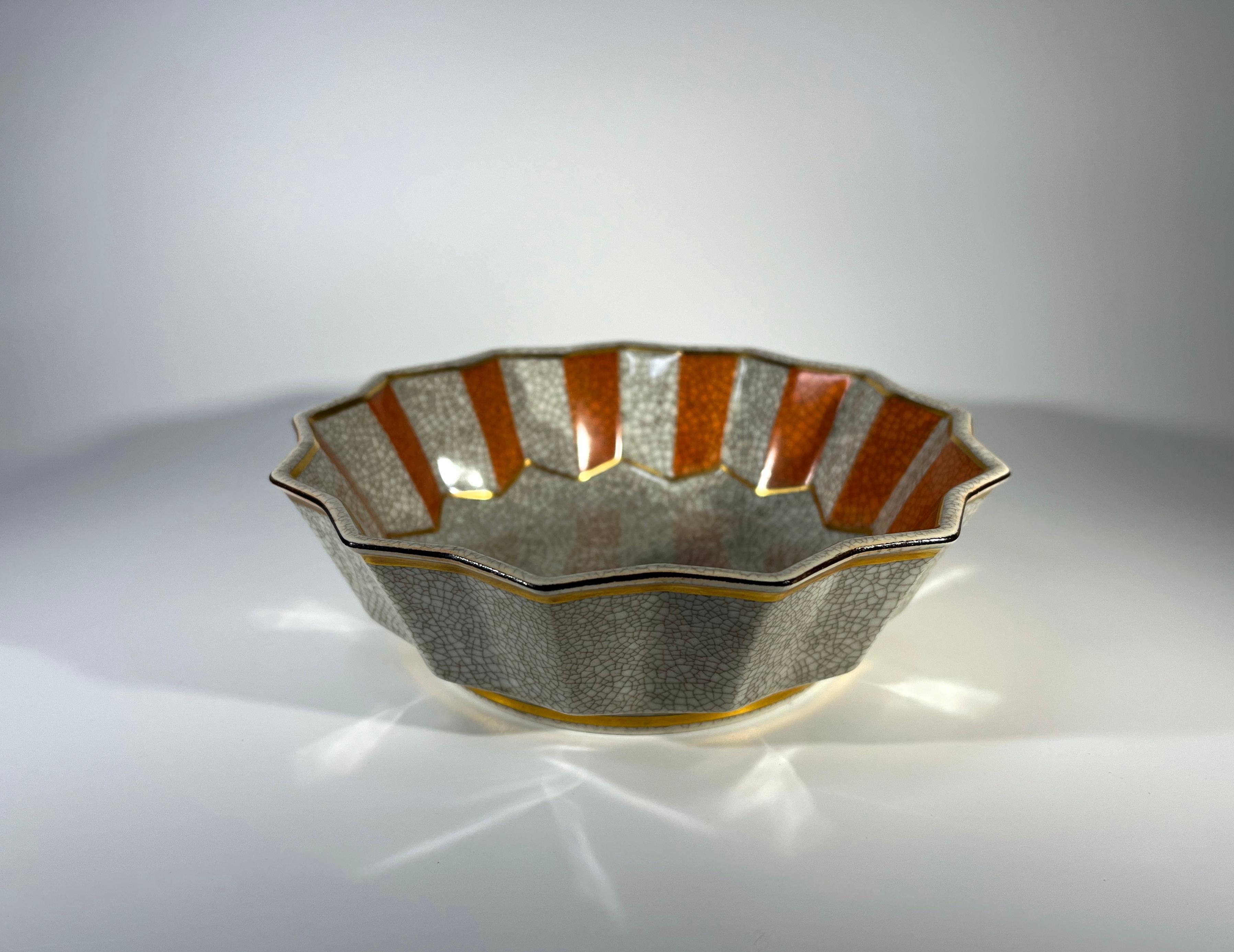 Royal Copenhagen porcelain terracotta and grey crackle glazed fluted dish designed by Thorkild Olsen
Superb gilded banding highlights Art Deco influence
Circa 1953
Stamped and numbered 3191
Height 2 inch, Diameter 6 inch
Excellent condition
Wear