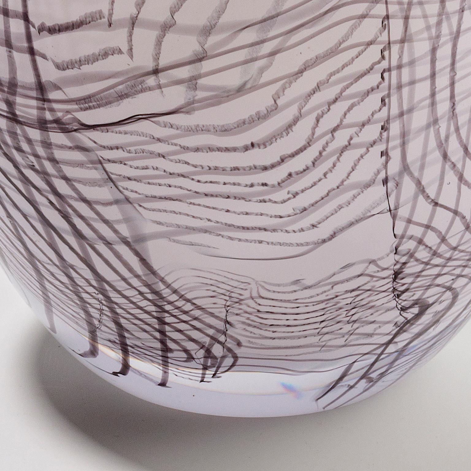 Hand blown white glass with grey thread-glass. Engraved top, grey thread-glass applied free handed while hot.
Made in Amsterdam, the Netherlands.