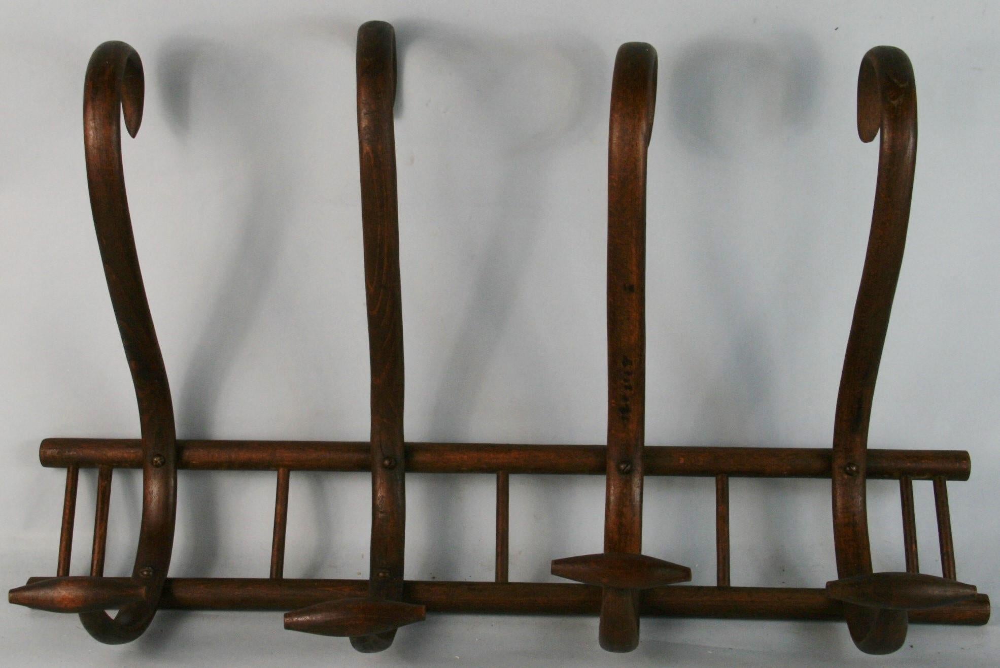 3-667 wall coat rack made in bent wood by Thornet in early 1920's
Elegant bentwood work typical of Thornet production.