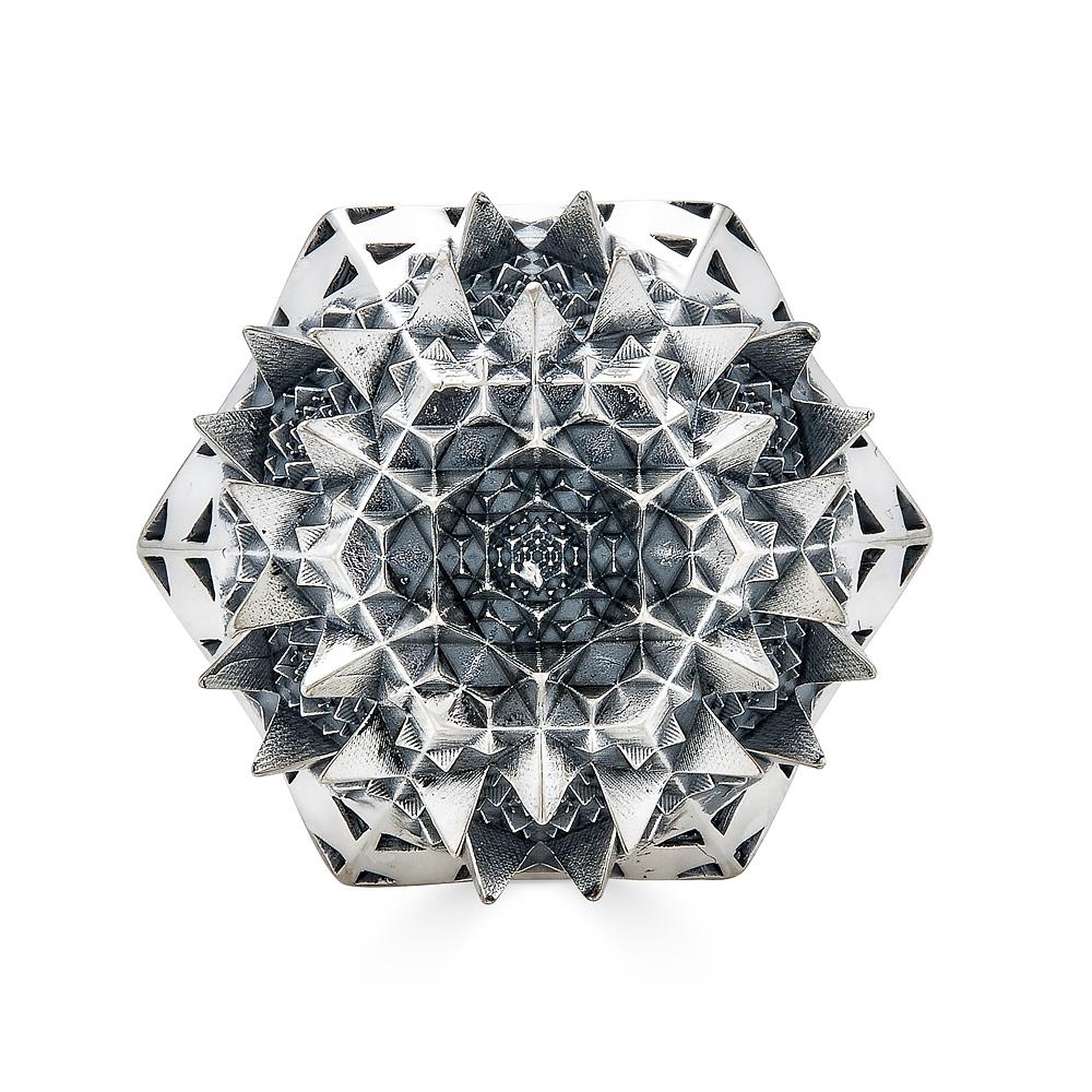 Using the THOSCENE customization platform developed by John Brevard, this piece is designed based on astrological systems and sacred geometry to complement patterns found in our cosmos. Featuring fractal patterns at multiple scales, this edgy