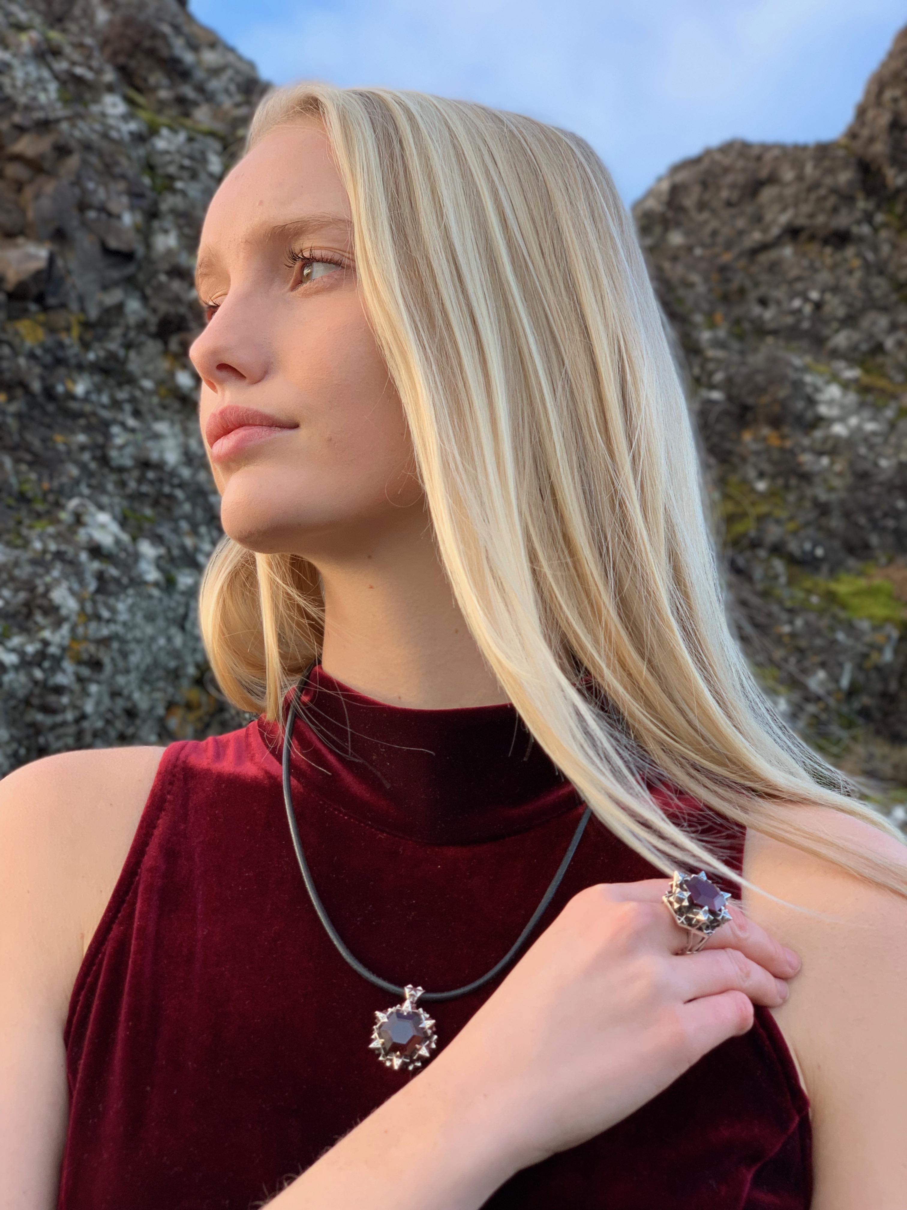 Modern Thoscene Garnet and Sterling Silver Love Pendant Necklace