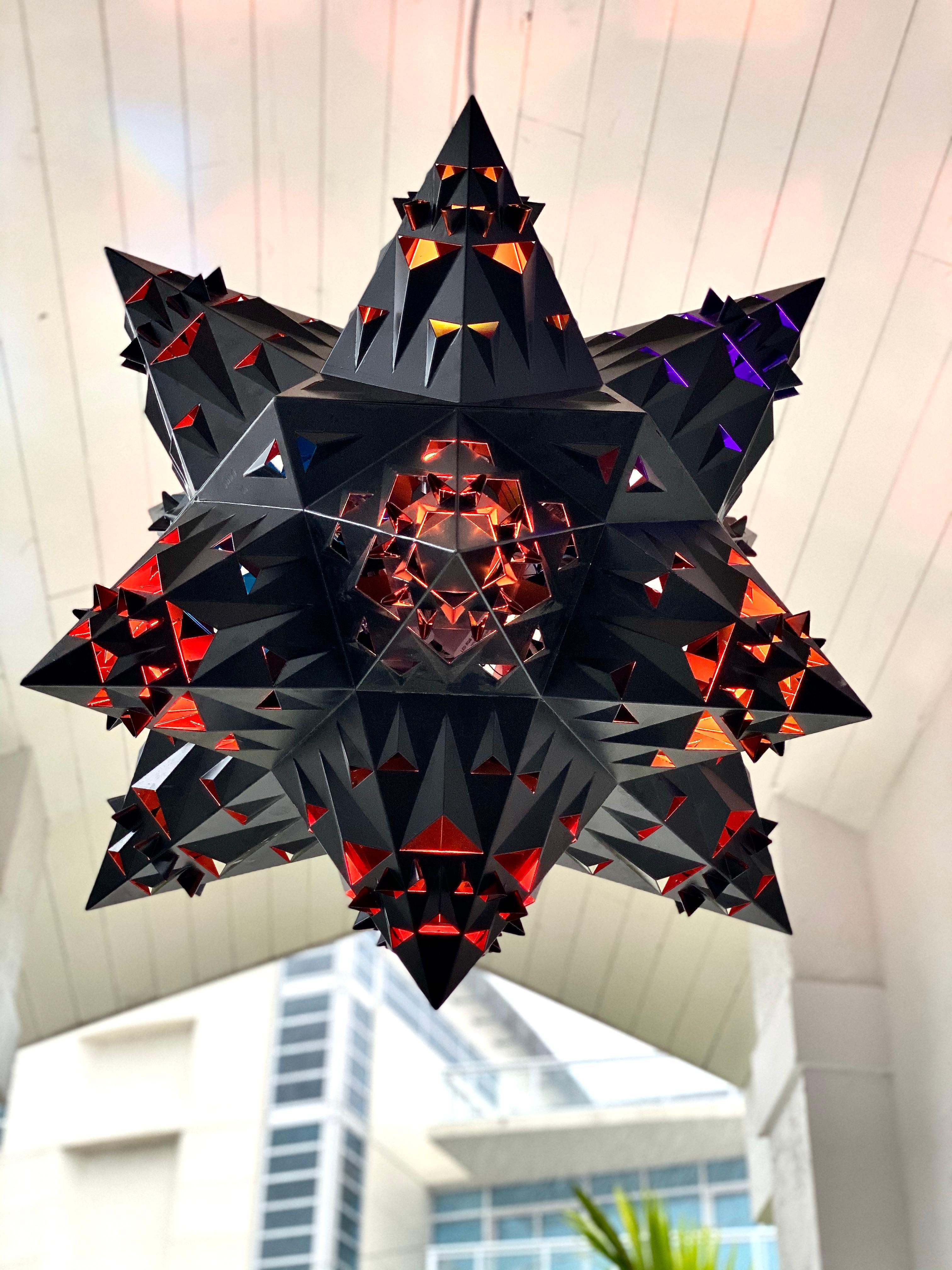 This sacred geometry inspired hex fractal chandelier creates an elegant but sophisticated addition to any space.

There is a meaning for this design using the pattern of 6; (as a numerological aspect of the hexagon) include: Communication,