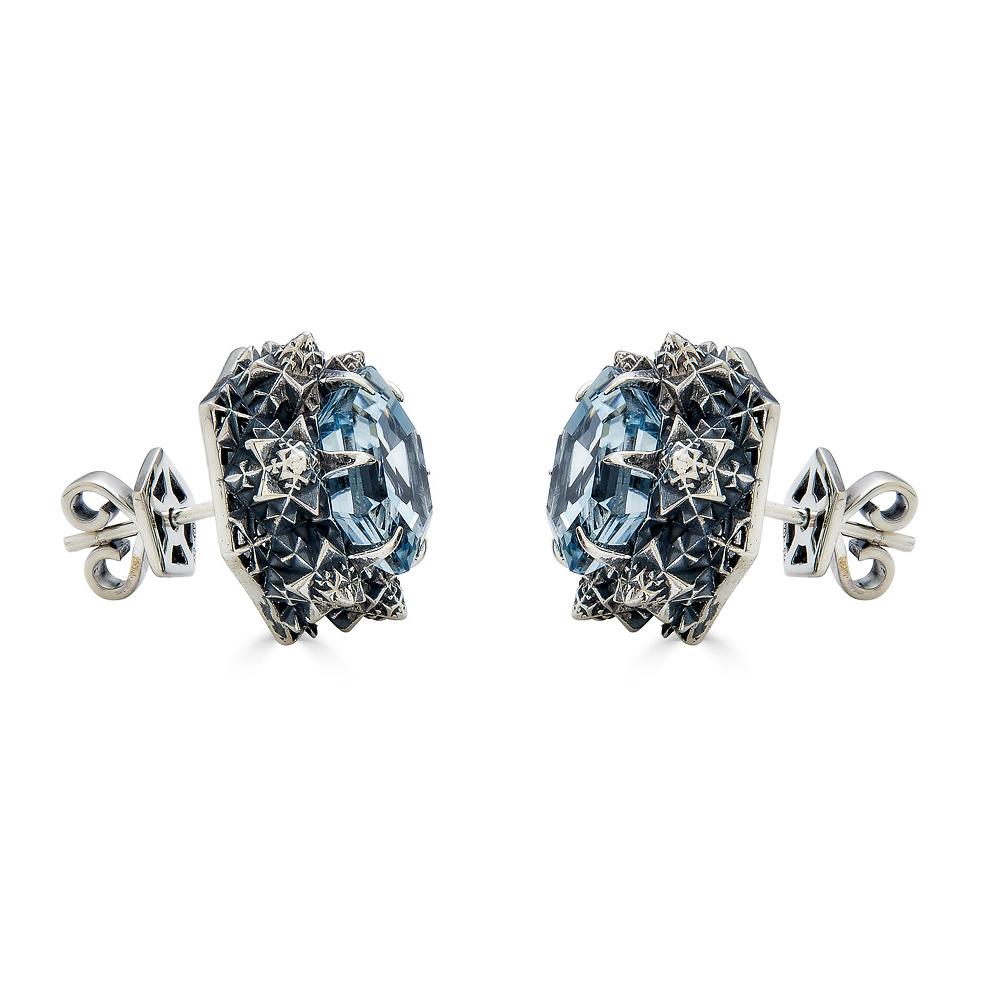 This unique Thoscene Aquamarine Silver Peace Earrings feature an aquamarine stone set in sterling silver. All of the pieces, including these earrings, in John Brevard’s Thoscene collection are 3D-printed using cutting edge technology. These earrings