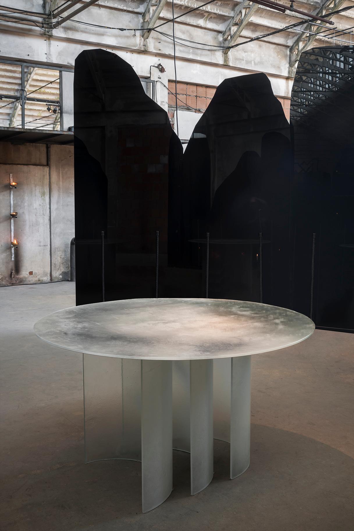 Thoth table by Studiopepe
Dimensions: D 140 x H 75 cm
Materials: Glass

Multifaceted design agency Studiopepe was founded in Milan in 2006. Eclectic, voguish, it is the
brainchild of Chiara di Pinto and Arianna Lelli Mami, both of whom obtained