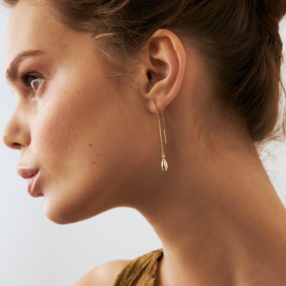 Introducing the 14K Solid Gold Threader Earrings, a reflection of Orena Jewelry's relentless pursuit of unmatched artistry. Every earring is carefully handcrafted, radiating an essence of luxury blended with contemporary finesse. It is the ultimate