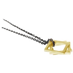 Three 18 Karat Gold Squares on Blackened Sterling Silver Chain