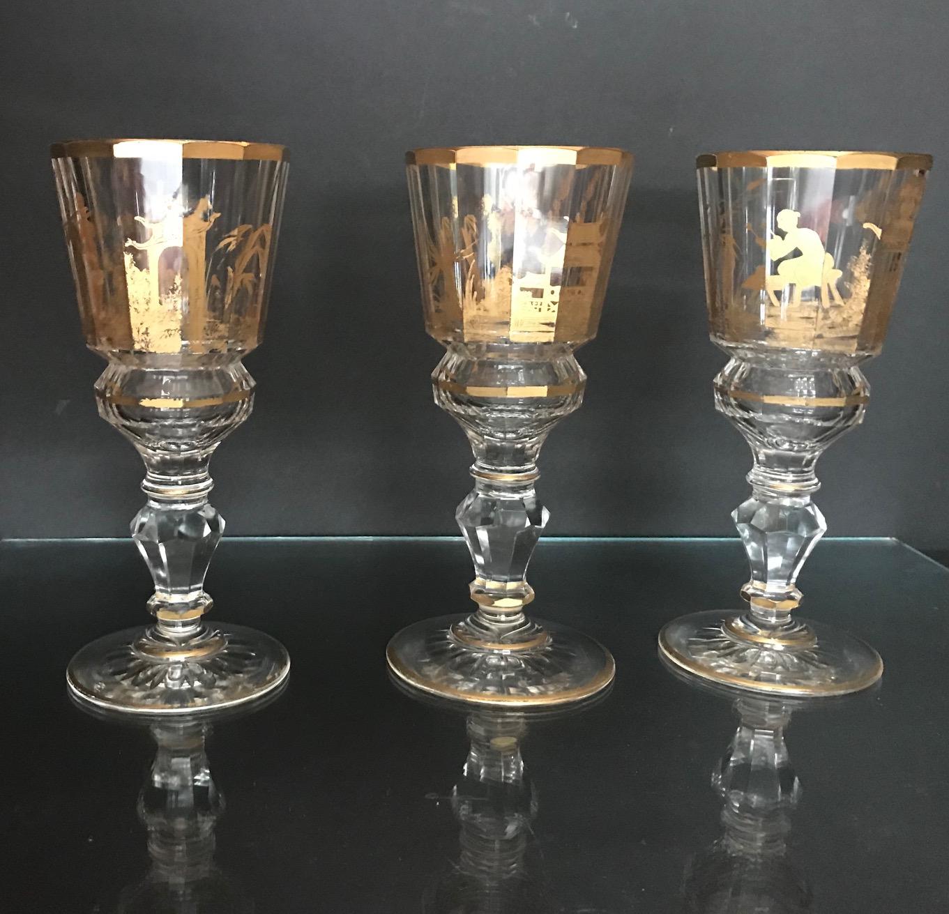 Three 18th century Bohemian facet cut gilded wine glasses, three goblets

These exquisite cut glasses are at the highest level of elegant and luxurious stemware. The base has different sizes of faceted knobs. A sunburst design is cut into the