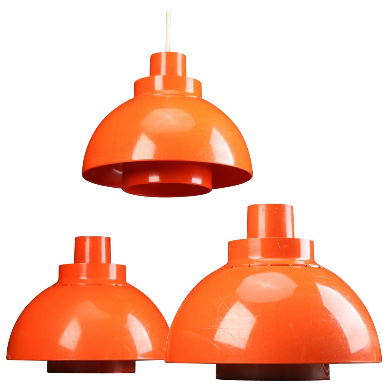 Three 1960s Danish Orange Model Minisol Pendant Lights by Svend Middelboe