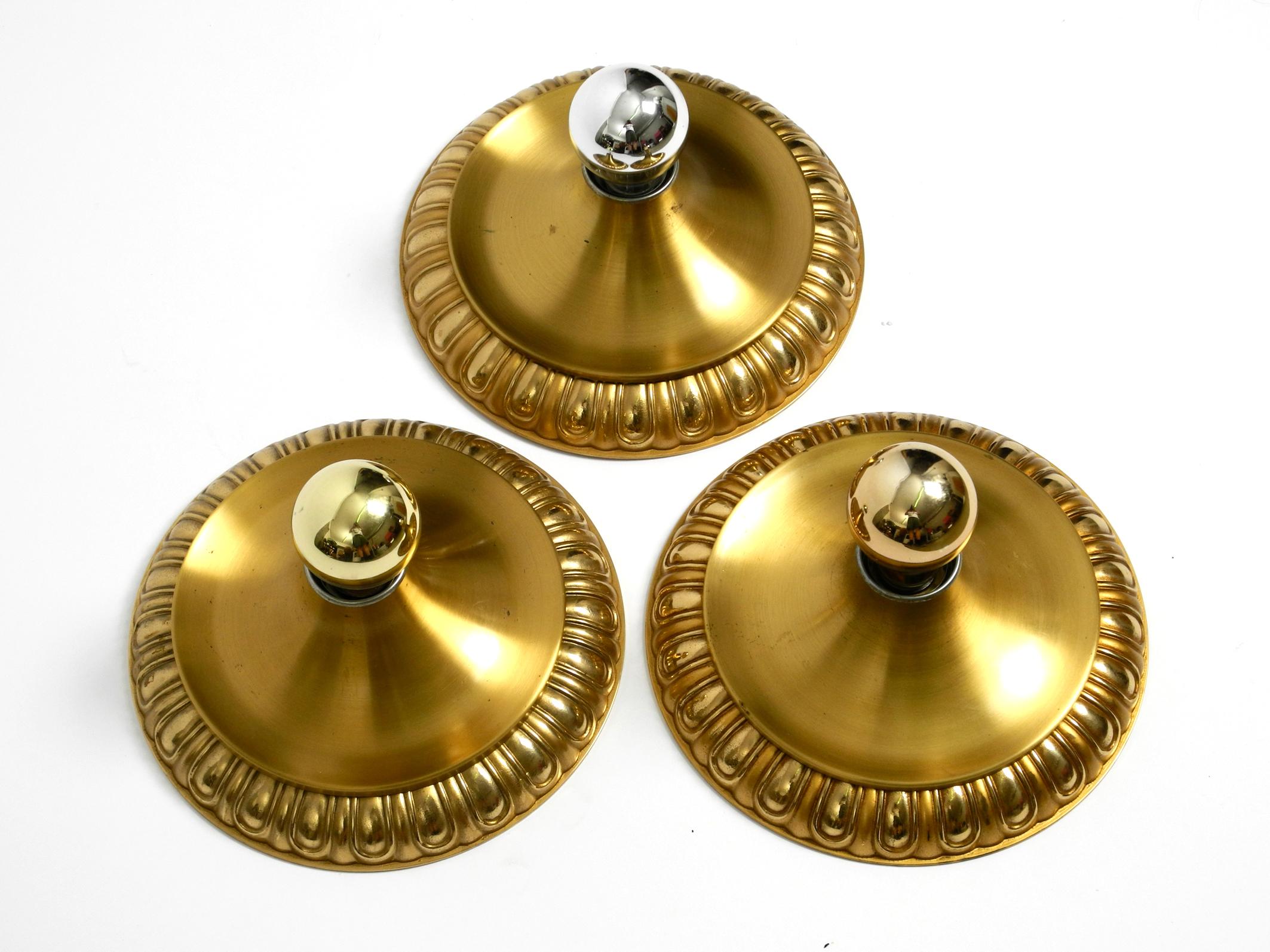 German Three 1960's Space Age round  brass and metal wall or ceiling lamps by Sölken For Sale
