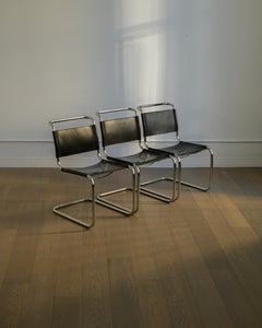 Three 1980s Bauhuas Mart Stam B33 Chairs in black leather by Fasem, Italy.