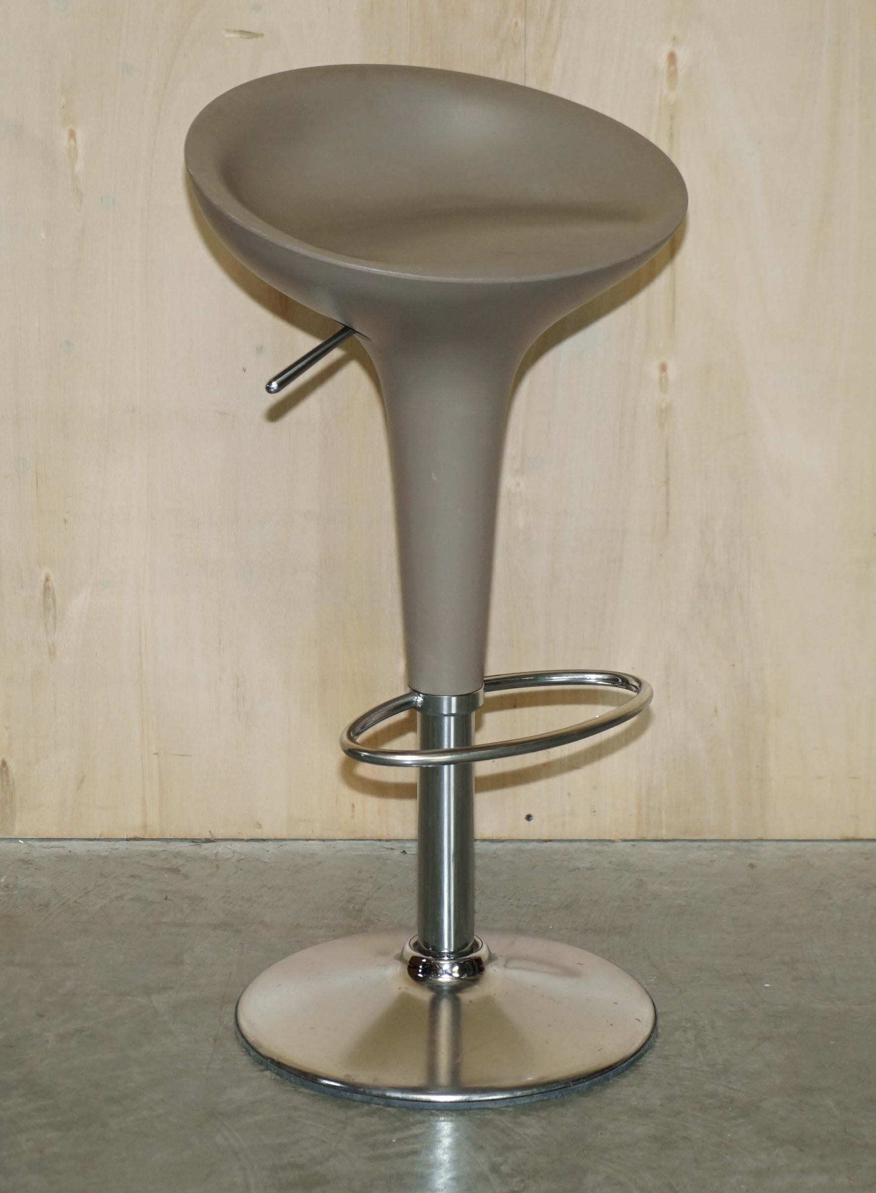 We are delighted to offer for sale this lovely suite of three, original 1997 Magis Bombo, height adjustable, Bar / Kitchen swivel stools designed by Stefano Giovannoni

A very nice suite indeed, you can actually buy these new today for around £550