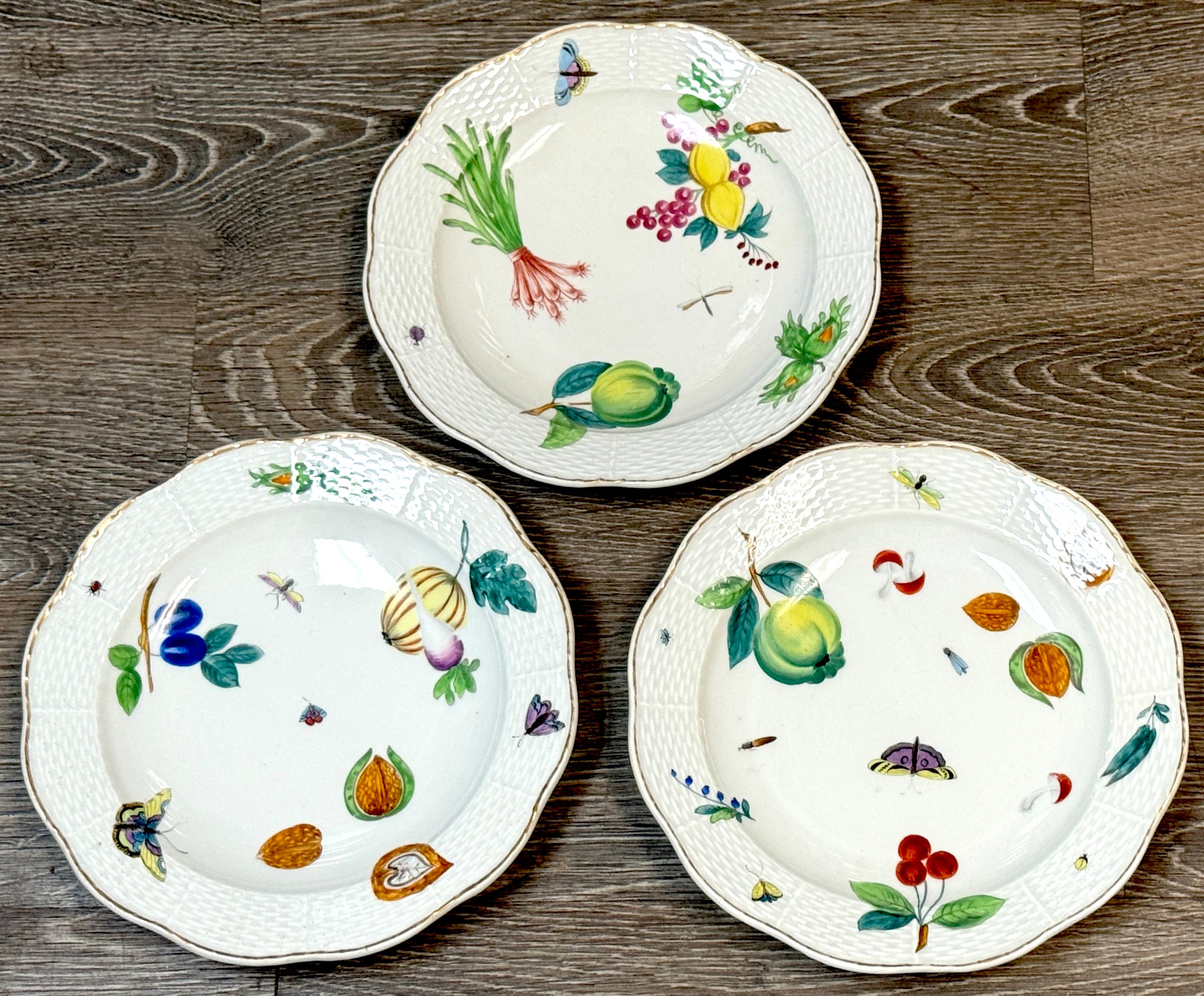 Set of Three 19th-Century Continental Hand-Painted Porcelain Plates with Naturalist Fruit & Insect Decoration

A captivating set of three finely hand-painted porcelain plates, dating to the 19th century or earlier, likely originating from a