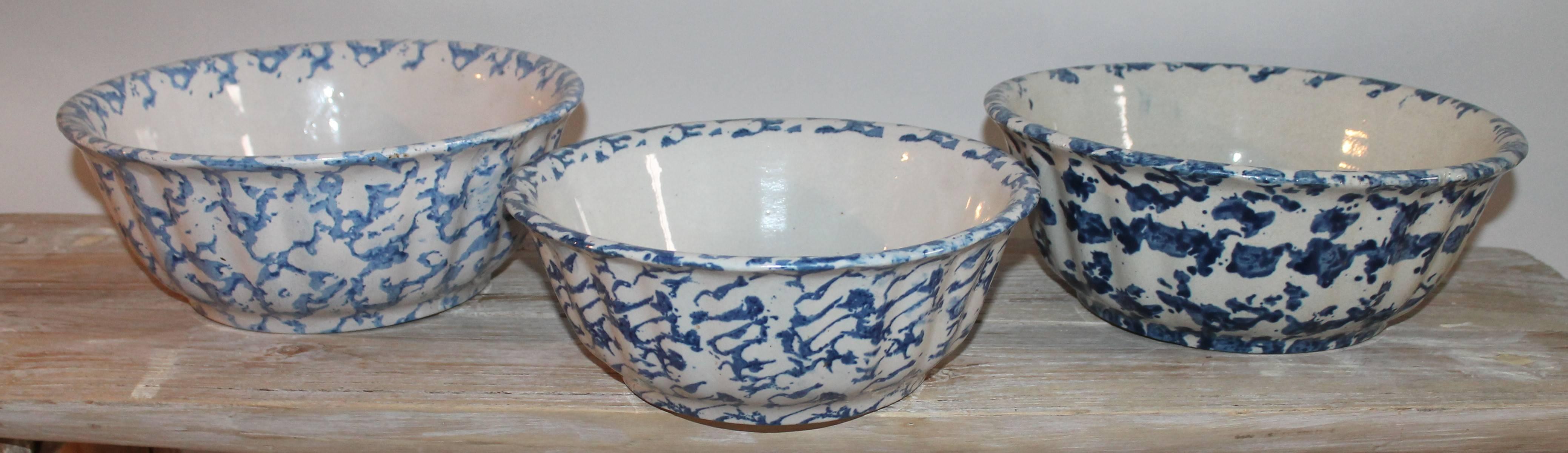 19th century scalloped sponge ware pottery bowls in different shades of blue. All in great condition and selling as a collection of three.

Small bowl measures 10 x 4 
Larger bowls measure 11 x 4.5.