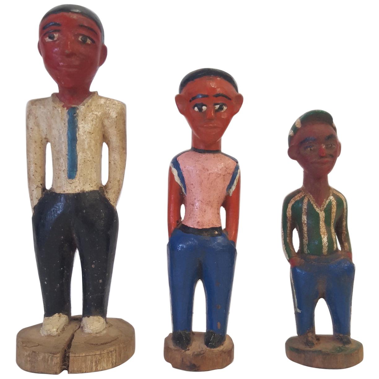 Three 20th Century, Wooden Ivory Coast Colonial Male Figures