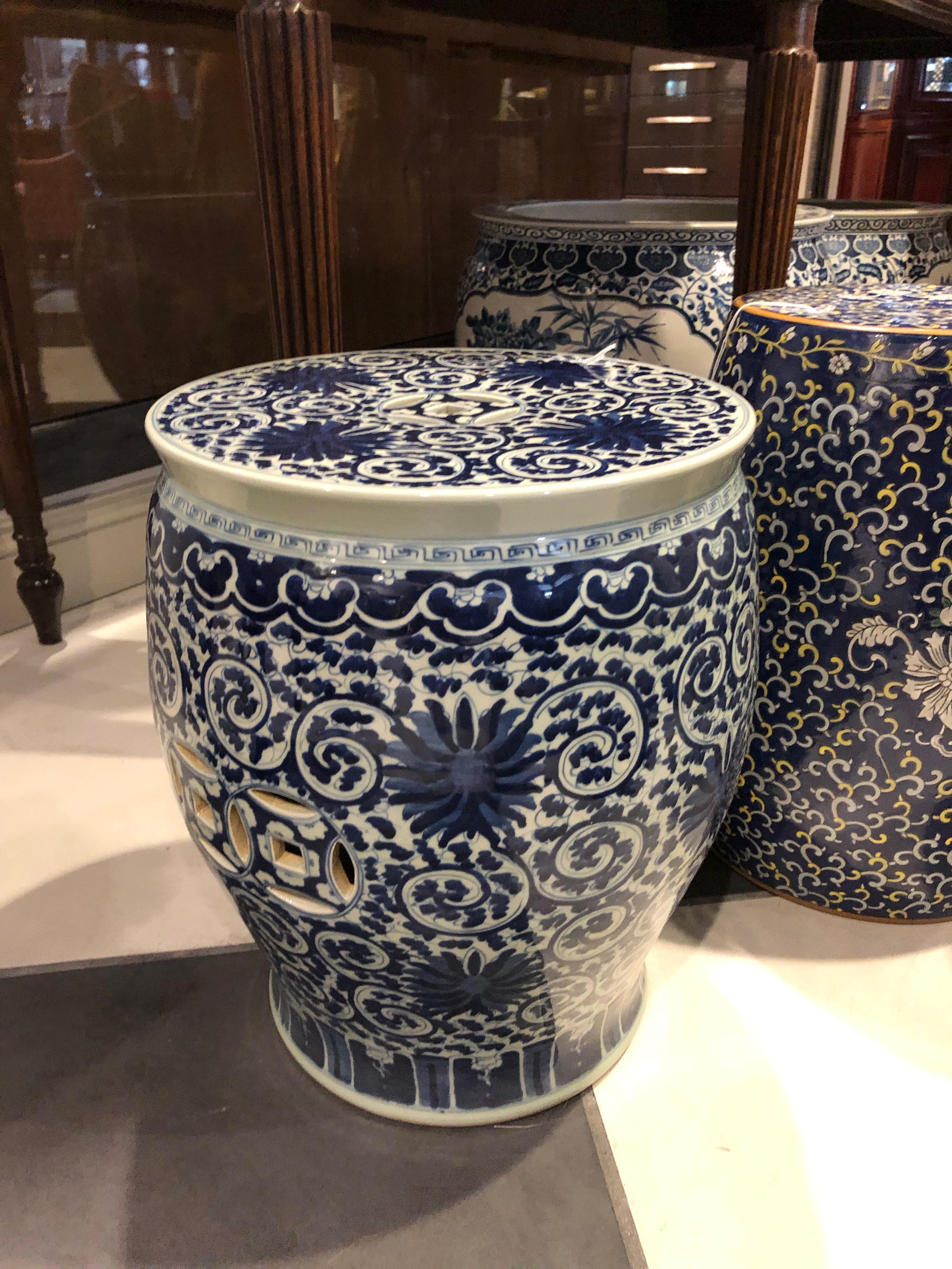 Three Chinese garden stools hand painting all the same size all the same price each garden stool is $1,275.00

Measures: 1 in blue and white 19 x 14 x 14
1 in more dark blue and white 16.5x 15 x15
and 1 in more teal blue, yellow and white with