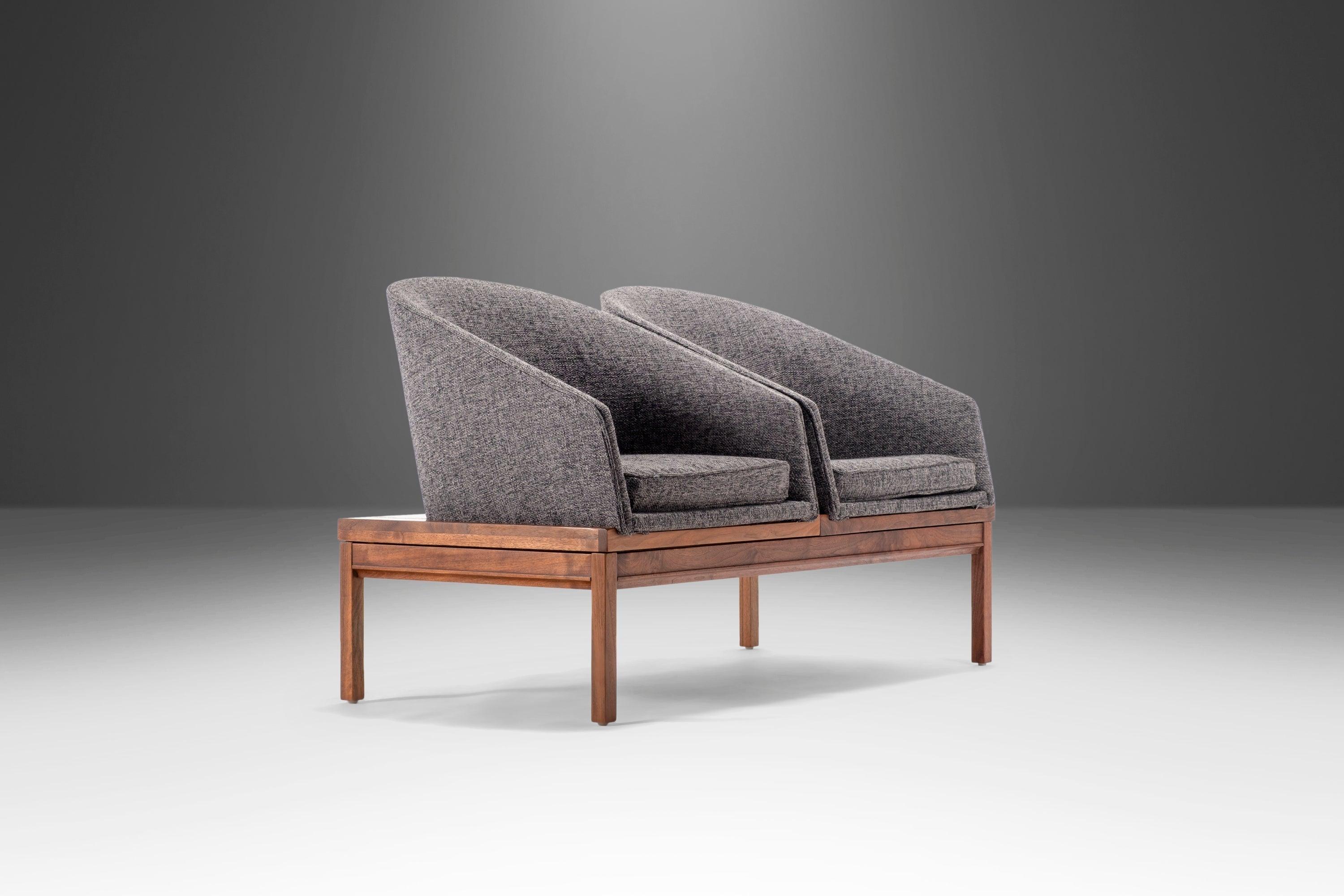 As comfortable as it is aesthetically pleasing this set of two modular benches, designed by the acclaimed Arthur Umanoff, is newly upholstered and ready for your space. Famous for using natural materials and new methods to reimagine traditional