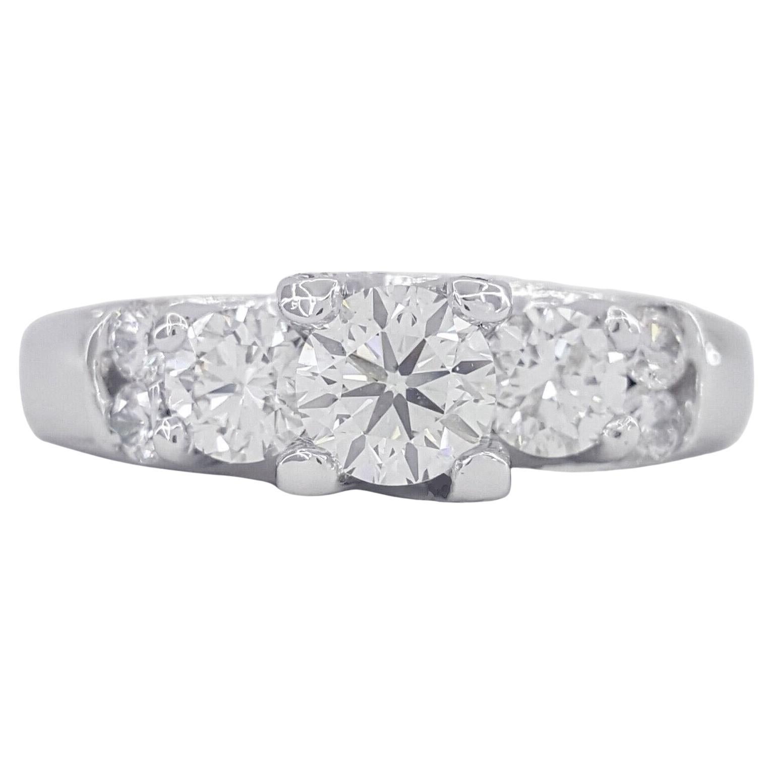 Three 3-Stone Round Brilliant Cut Diamond Engagement Ring