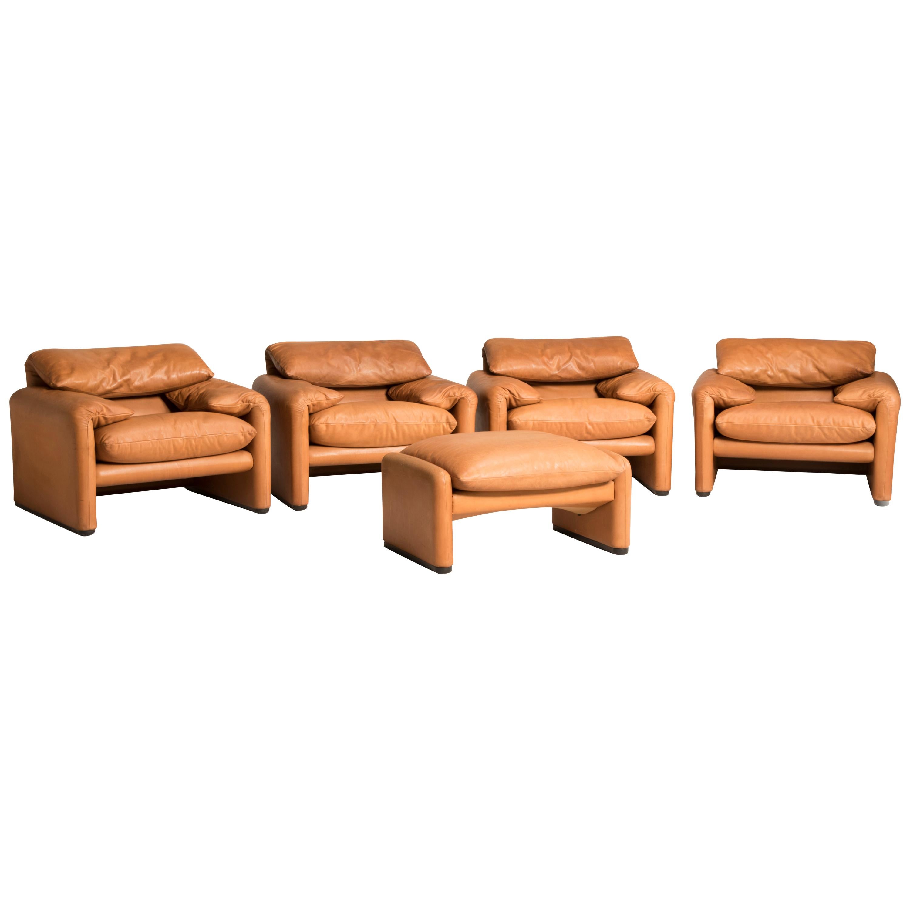 Three 675 Maralunga tobacco leather armchairs by Vico Magistretti for Cassina.
Three armchairs are available, you can buy the entire group of five items or you can divide the group.
The whole set is from late 1980s, the general conditions are very
