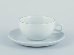 Three Aluminia/Royal Copenhagen blue line coffee cups and saucers.