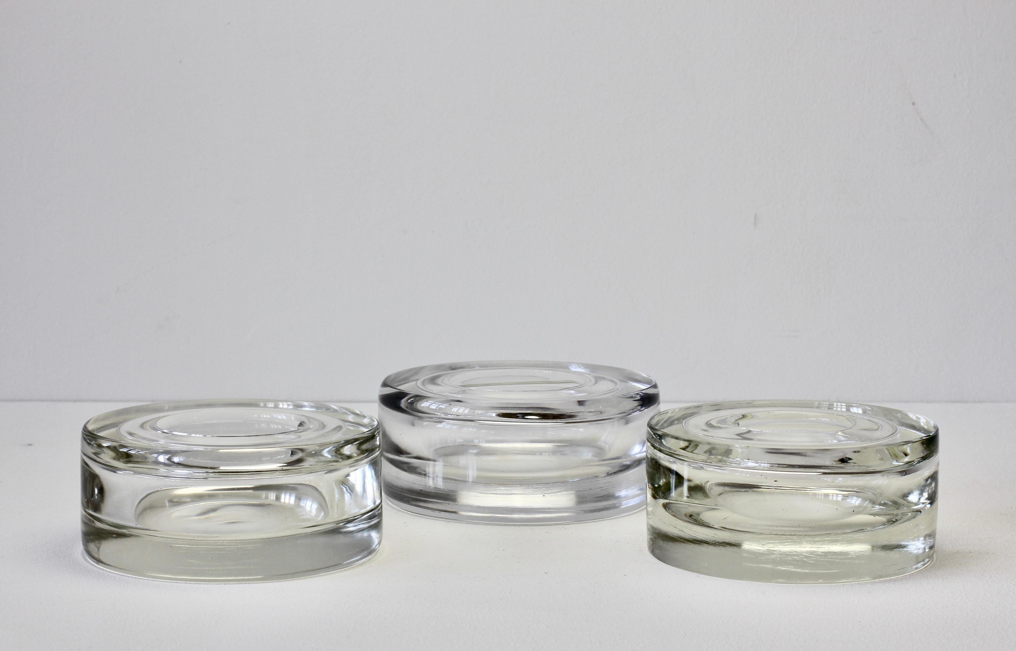 Antonio Da Ros for Cenedese, rare set / collection of three large heavy vintage Italian Murano glass bowls or ashtrays circa 1975. Utilizing the Sommerso technique these large, heavy pieces of glass each feature two submerged sections of clear glass