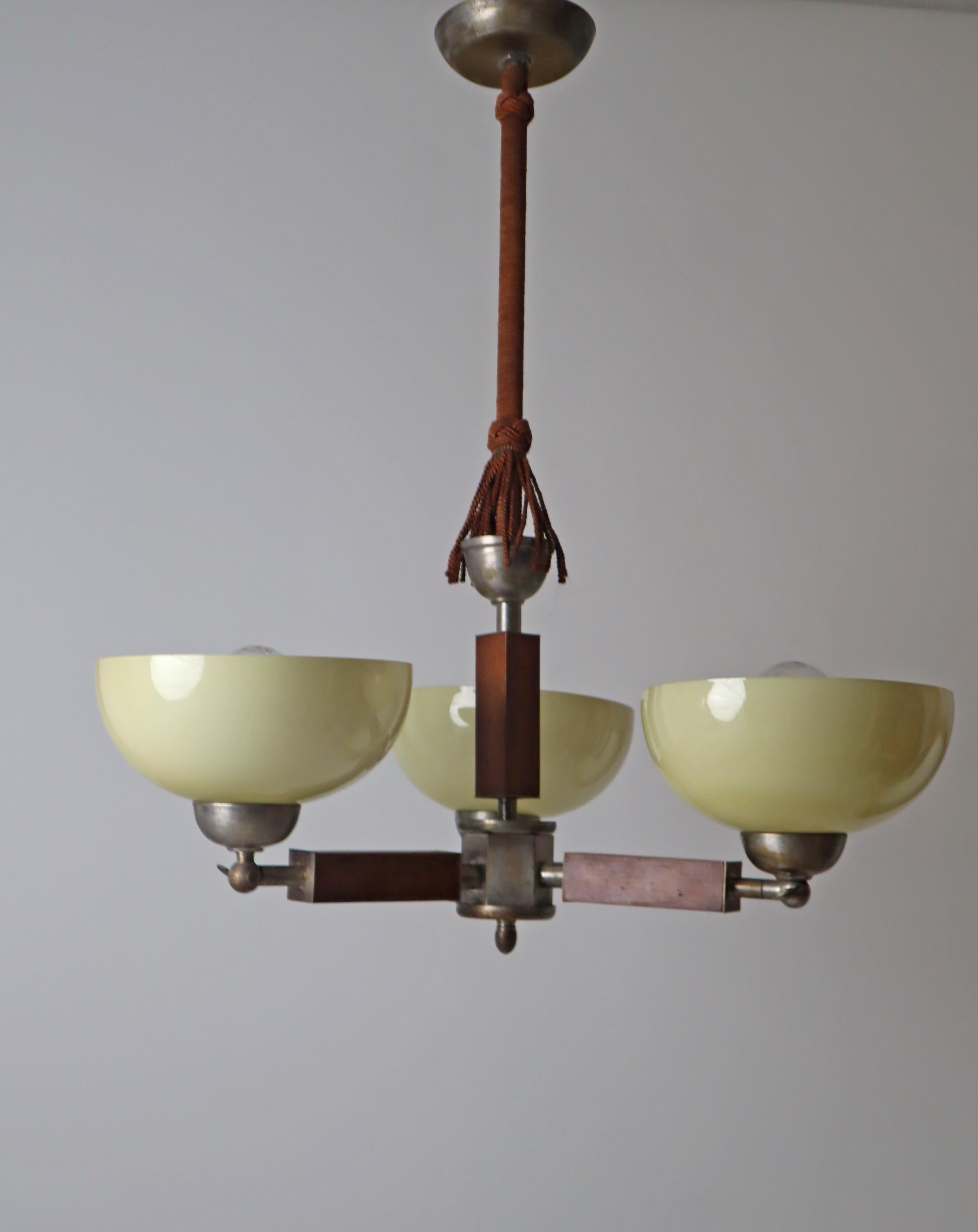 Three arm Art-deco chandelier made out of glass wood and chrome.  Germany 1930s For Sale 4
