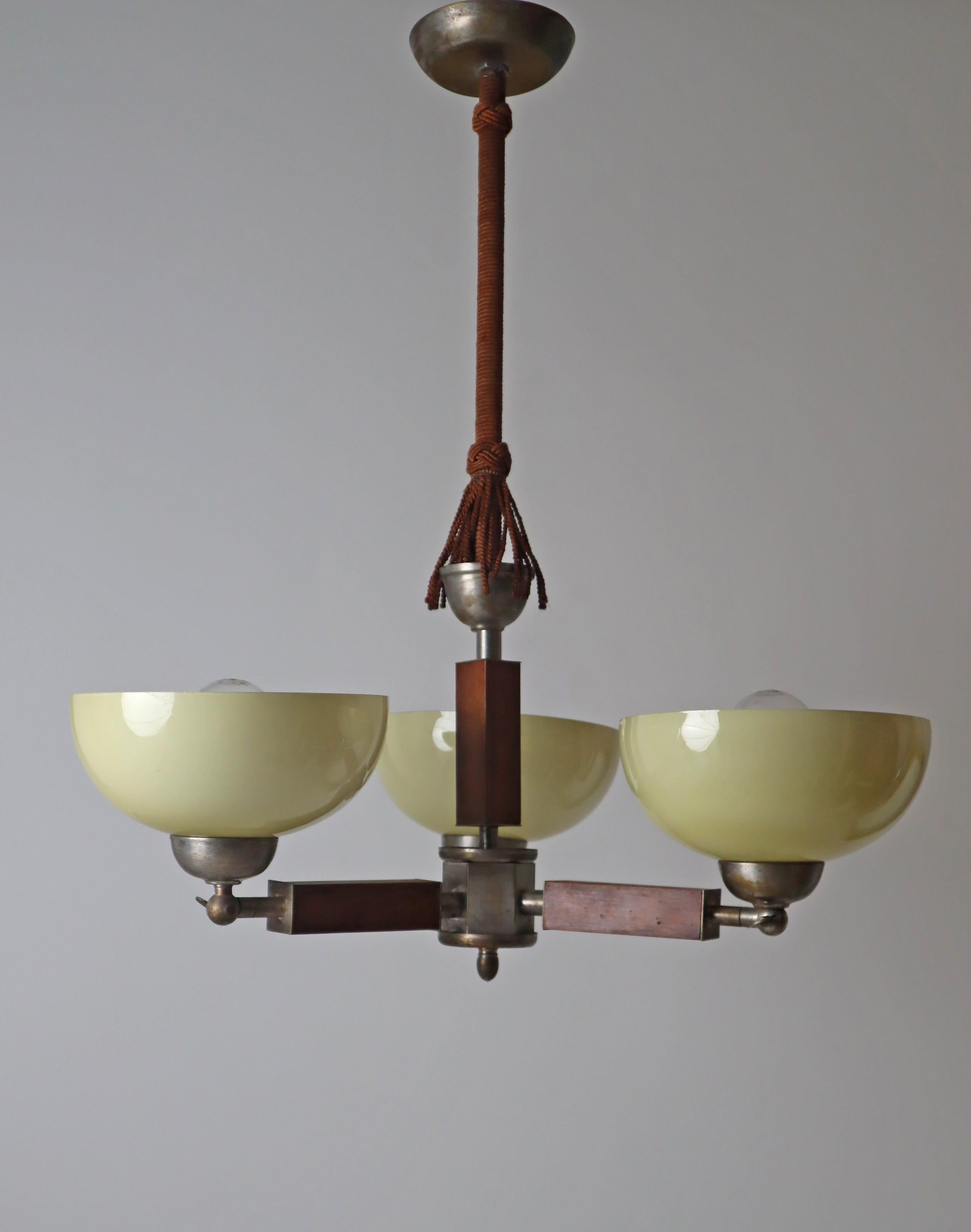 Three arm Art-deco chandelier made out of glass wood and chrome.  Germany 1930s For Sale 5