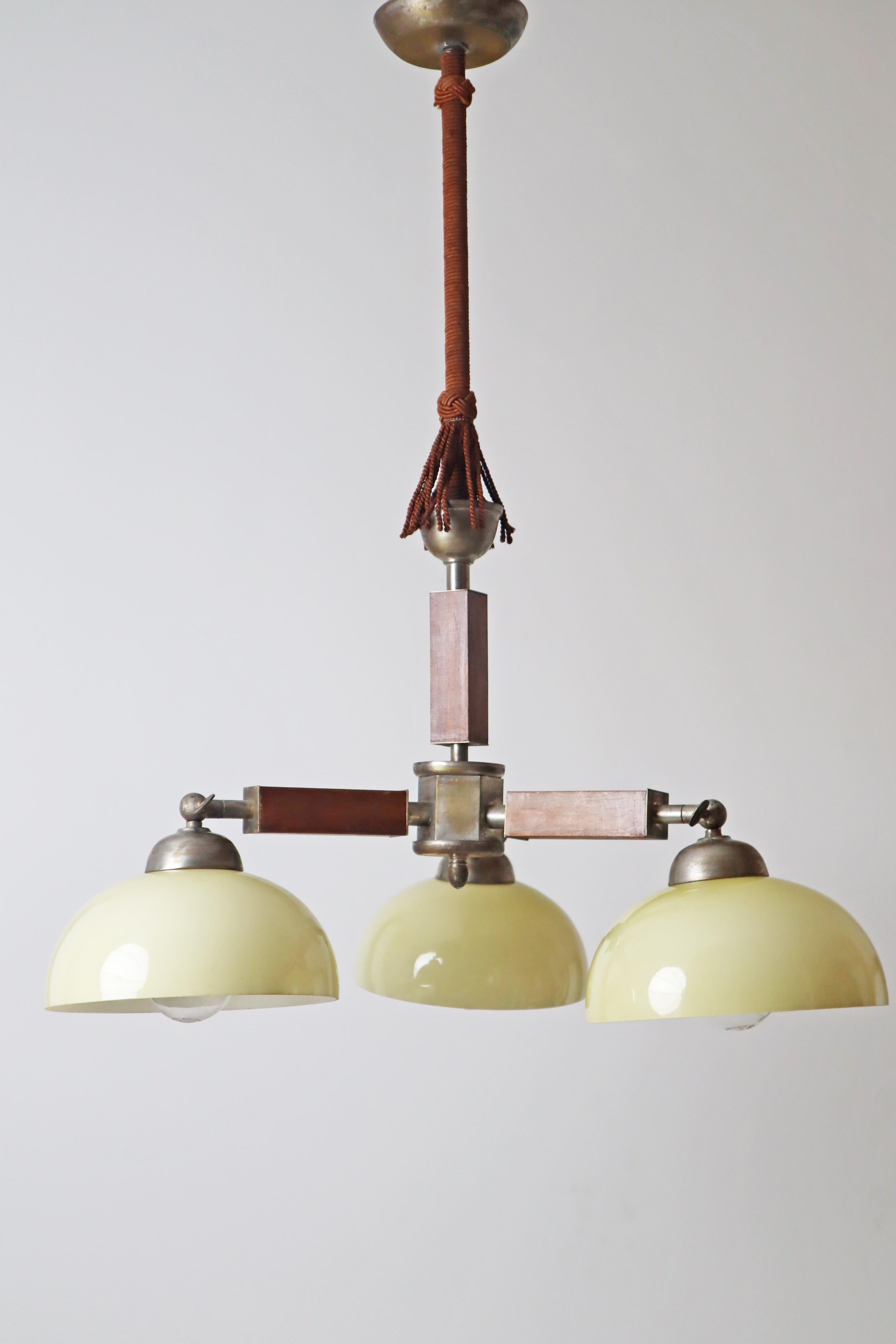 Three arm Art-deco chandelier made out of glass wood and chrome.  Germany 1930s For Sale 8