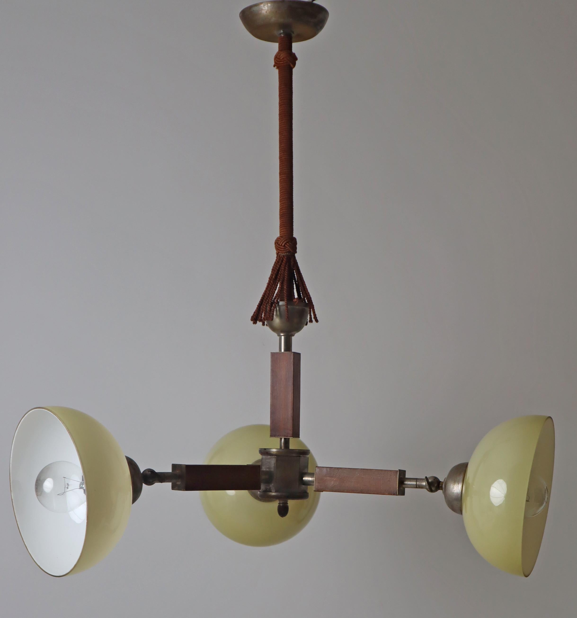 Three arm Art-deco chandelier made out of glass wood and chrome.  Germany 1930s For Sale 9