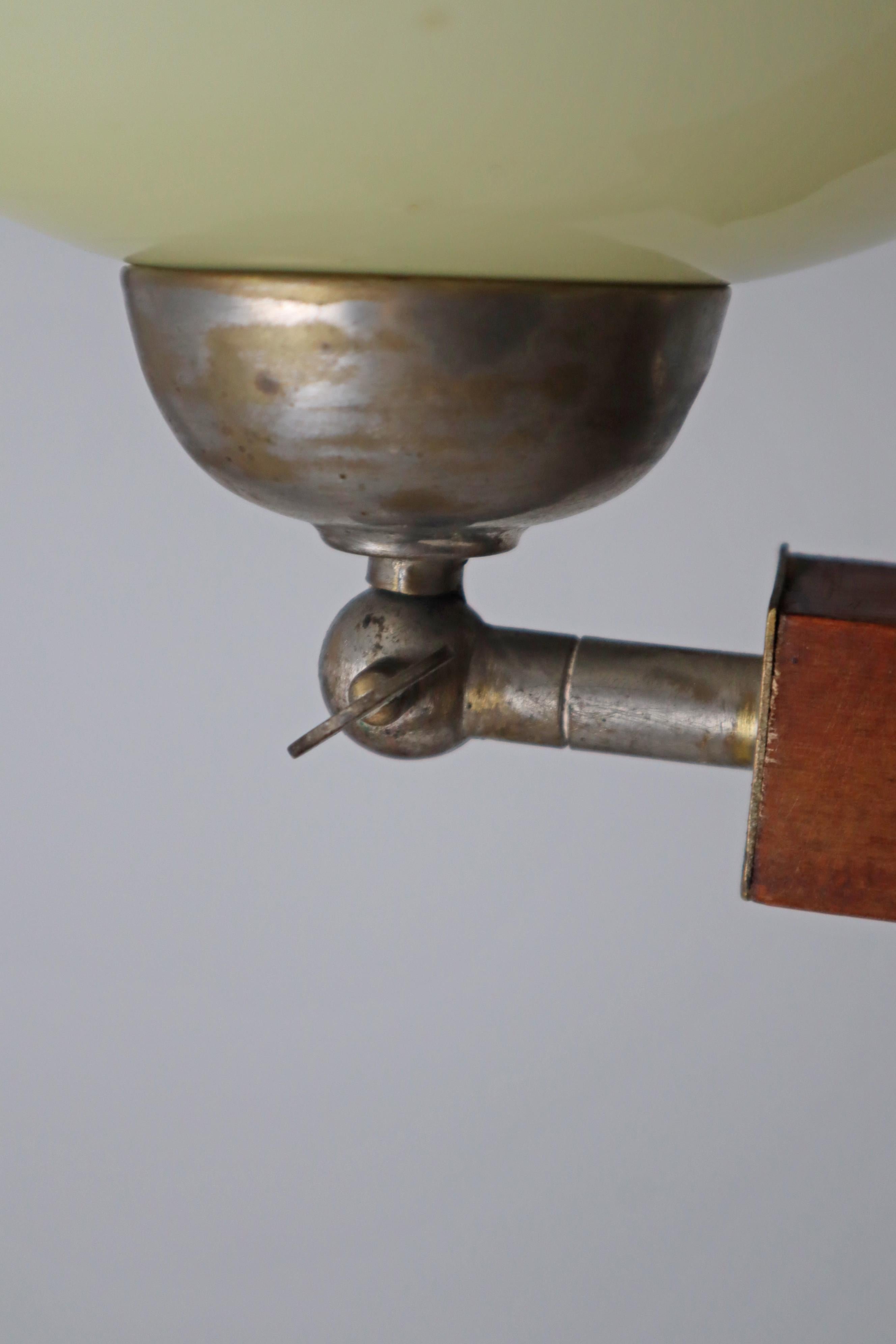 Three arm Art-deco chandelier made out of glass wood and chrome.  Germany 1930s In Good Condition For Sale In Hannover, DE