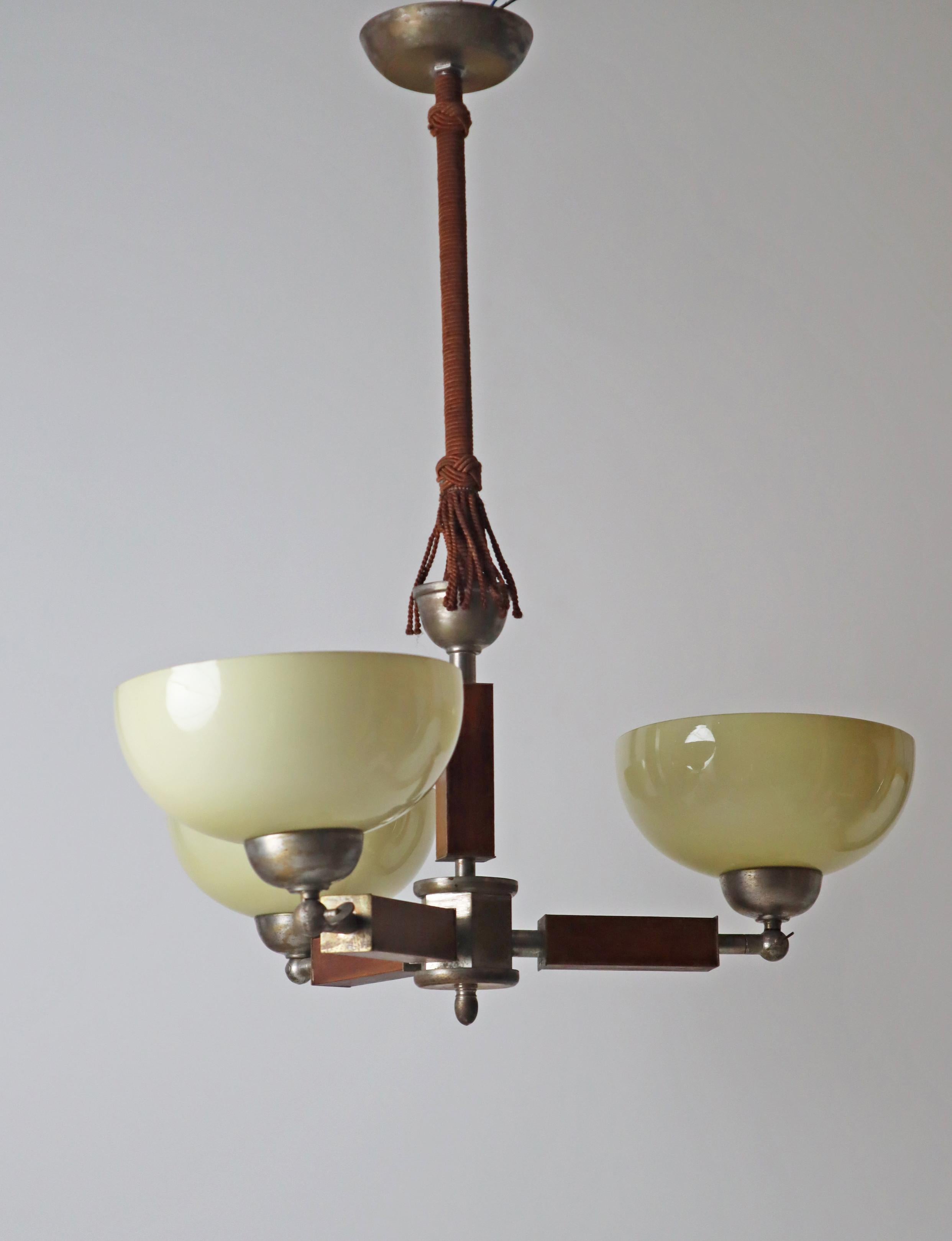 Three arm Art-deco chandelier made out of glass wood and chrome.  Germany 1930s For Sale 2